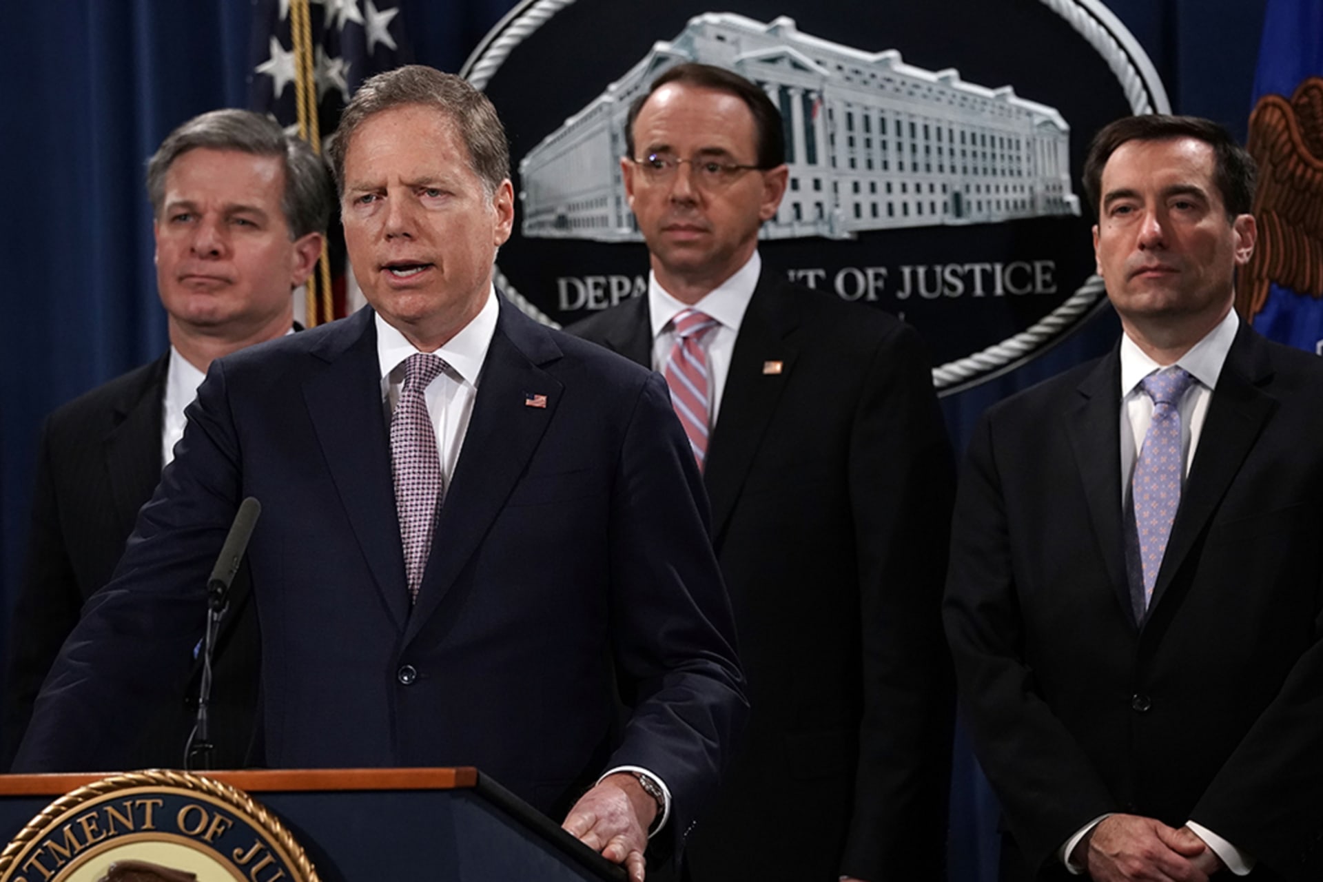 <p>U.S. Attorney for the Southern District of New York Geoffrey Berman (2nd L) speaks as (L-R) FBI Director Christopher Wray, U.S. Deputy Attorney General Rod Rosenstein and Assistant Attorney General for National Security John Demers listen during a news co</p>
