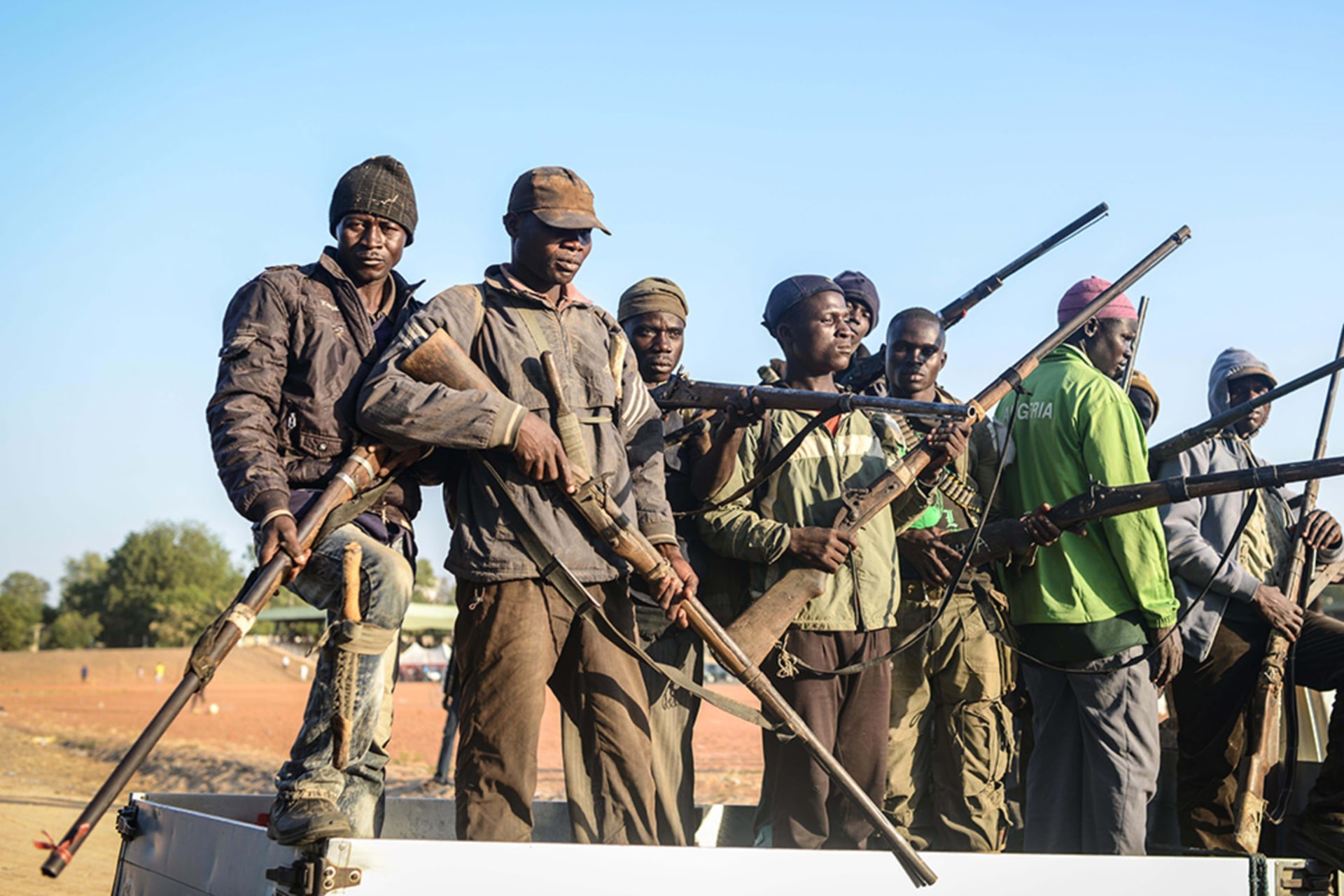 <p> Local hunters armed with locally made guns in Yola city of Adamawa State in Nigeria before they move to border region between Nigeria and Cameroon to support Nigerian army fighting Boko Haram militants on December 06, 2014.</p>
