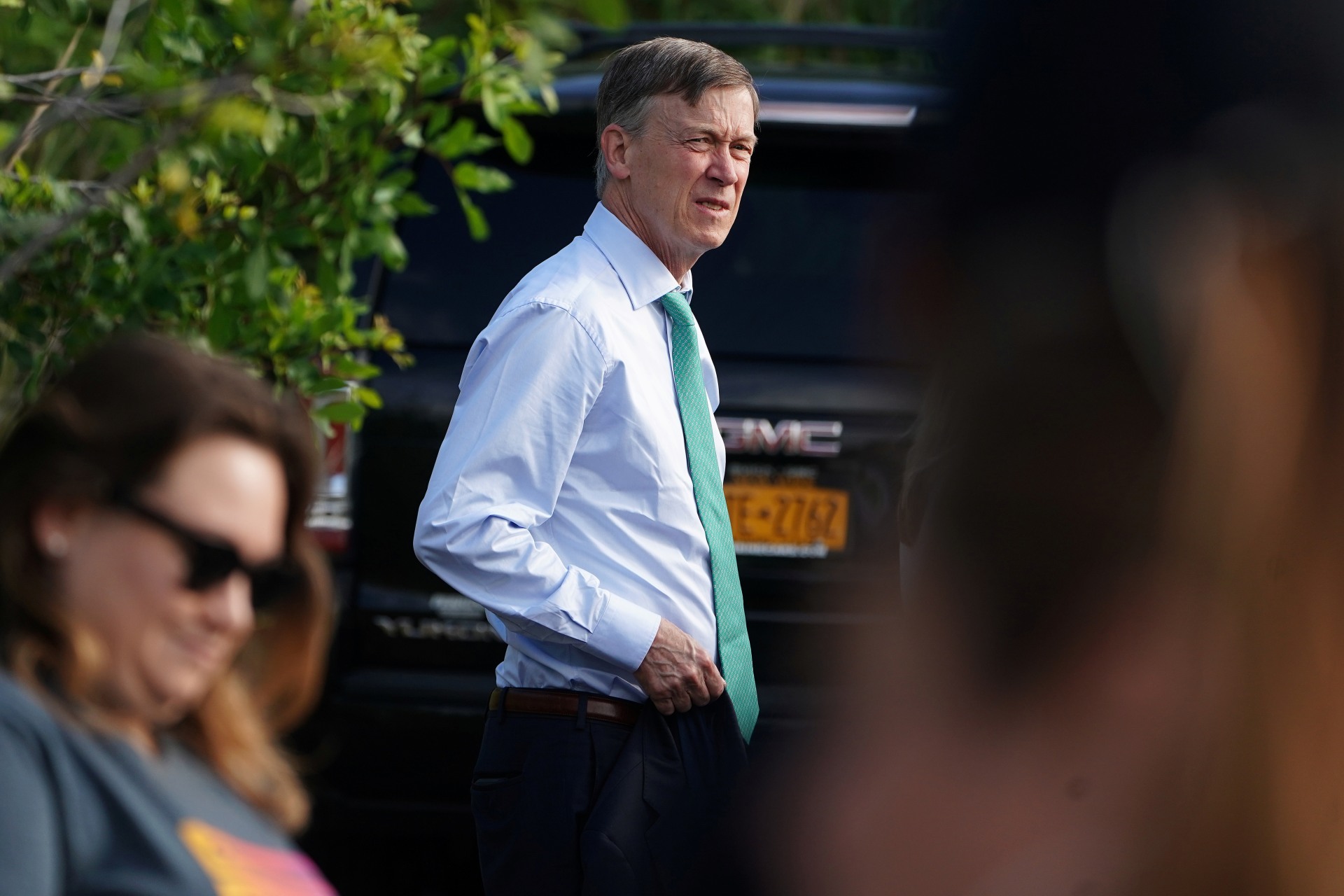 <p>John Hickenlooper arrives at a detention facility for youths incarcerated in Homestead, Florida. Carlo Allegri/REUTERS </p>