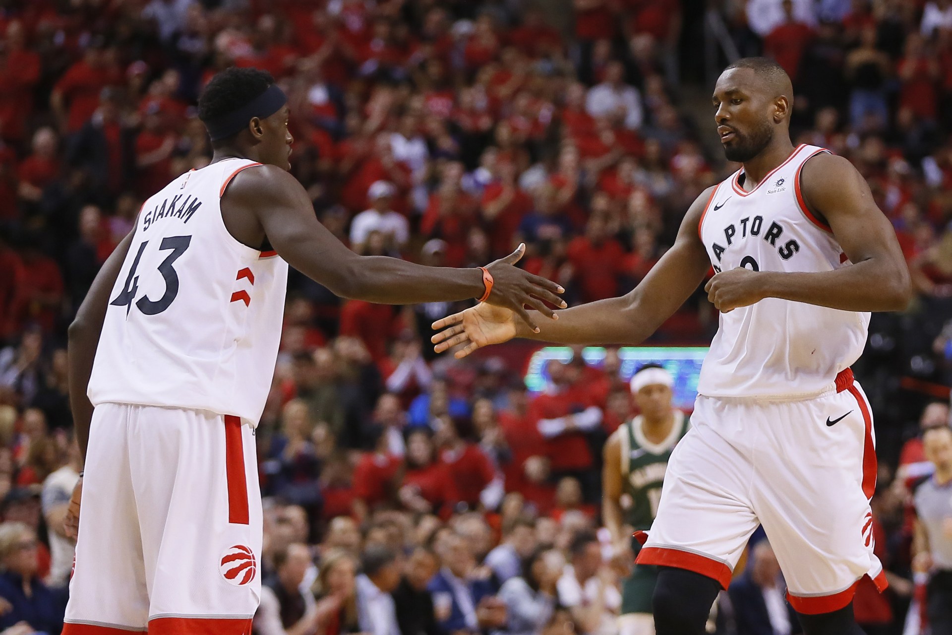 <p>Toronto Raptors’ Pascal Siakam (Cameroon) and Serge Ibaka (Republic of Congo) celebrate a play against the Milwaukee Bucks during game four of the Eastern conference finals of the 2019 NBA Playoffs at Scotiabank Arena in Toronto, Canada, on May 21, 2019.</p>
