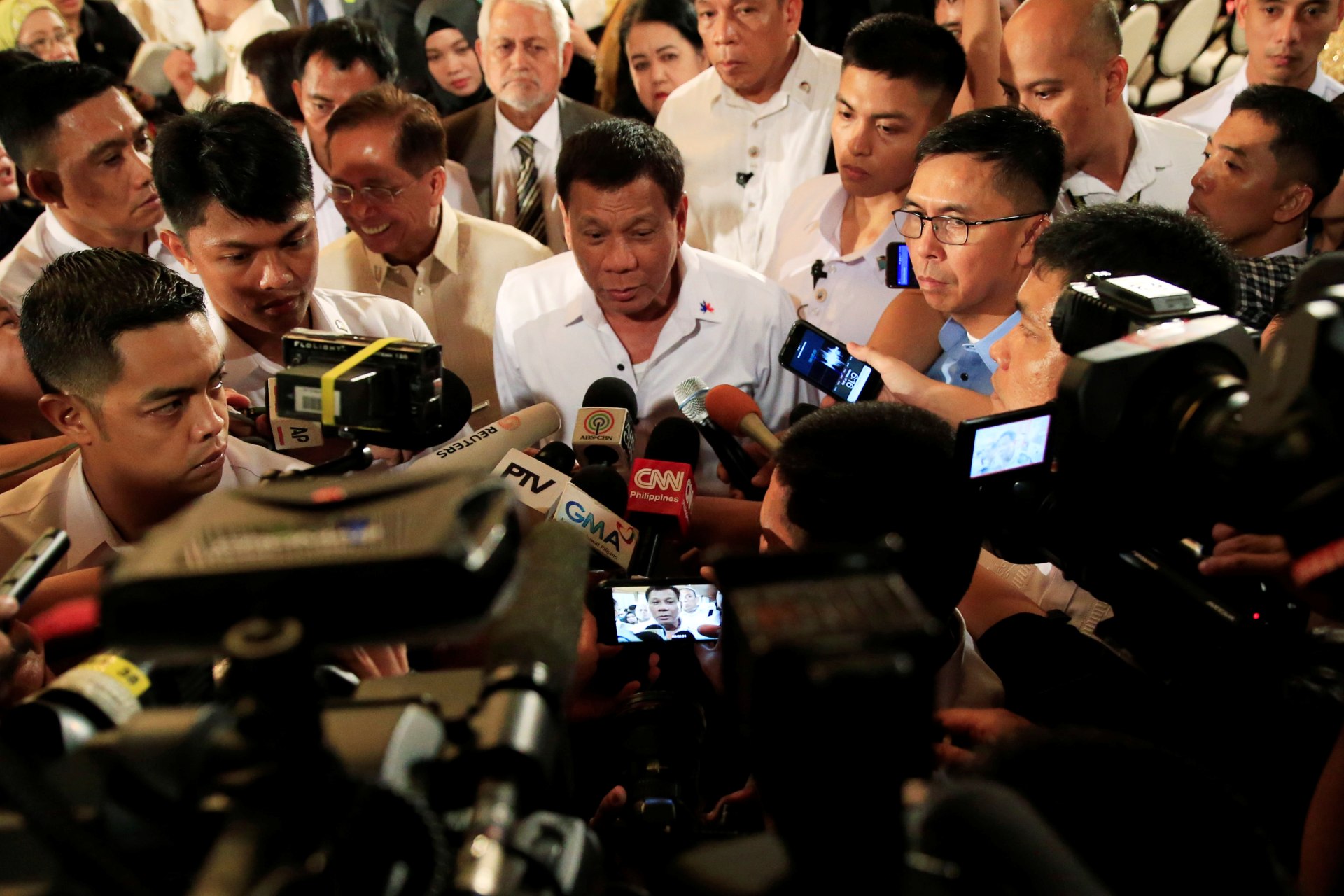 <p>Philippine President Rodrigo Duterte is interviewed by reporters after the handover of a draft law of the Bangsamoro Basic Law (BBL) in a ceremony at the Malacanang presidential palace in metro Manila, Philippines on July 17, 2017.</p>
