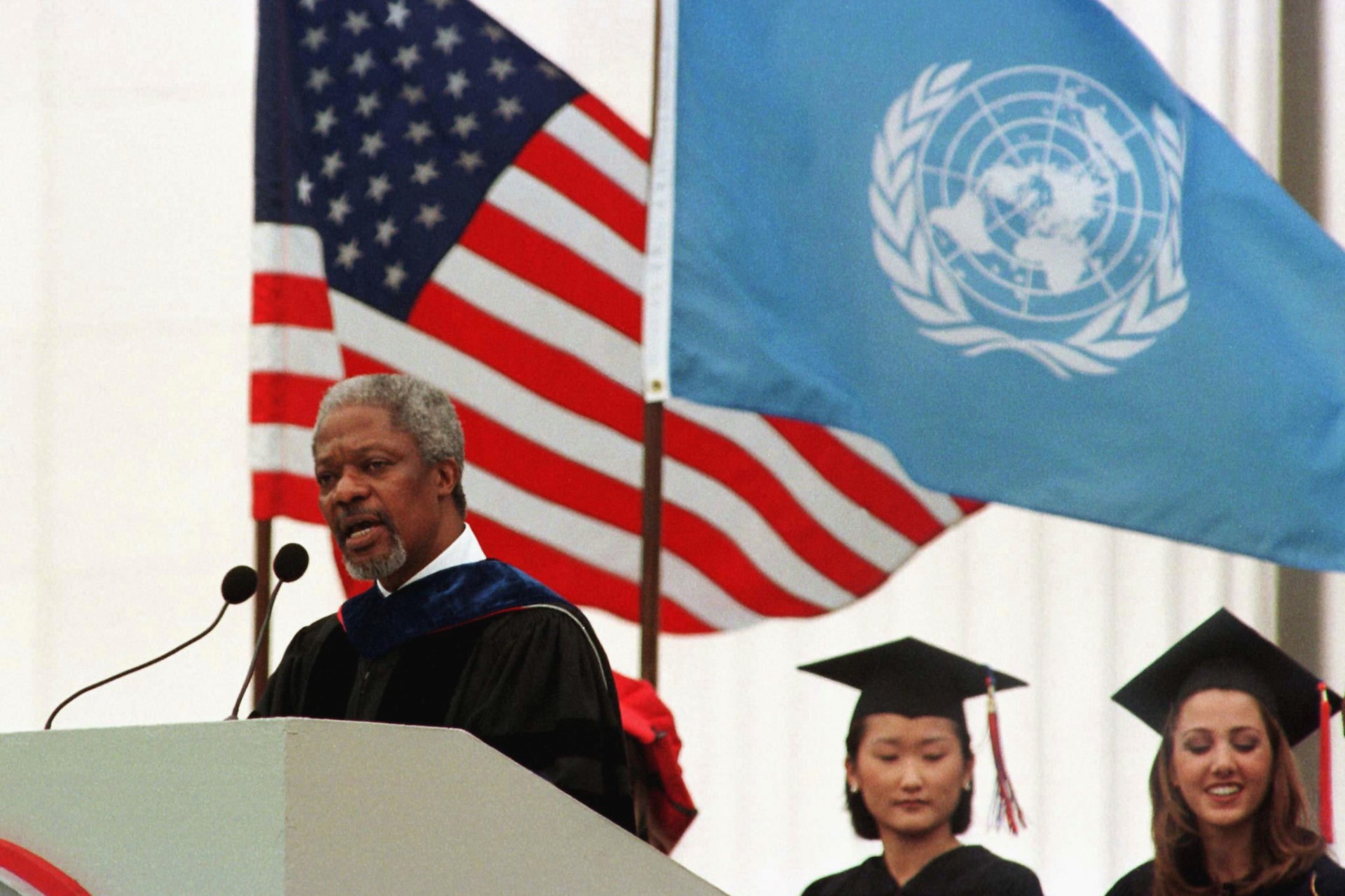 <p>UN Secretary General Kofi Annan of Ghana is flanked by U.S. and UN flags as he delivers the Masachusetts Institute of Technology’s 1997 commencement address on June 6. </p>
