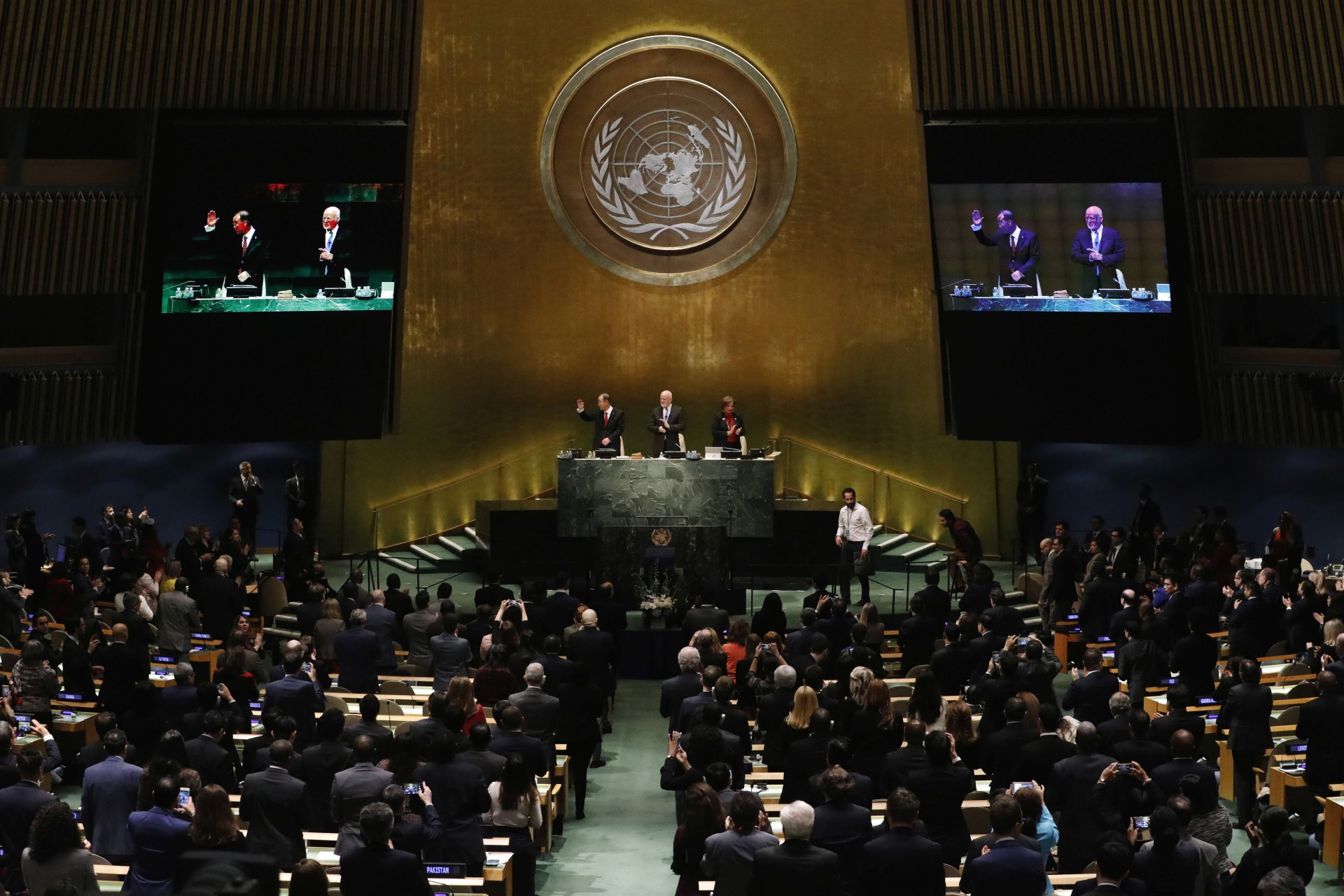 <p>United Nations Secretary-General Ban Ki-moon waves to the assembly after speaking during the swearing-in of Secretary-General-designate Mr. Antonio Guterres at UN headquarters in New York, U.S., December 12, 2016.</p>
