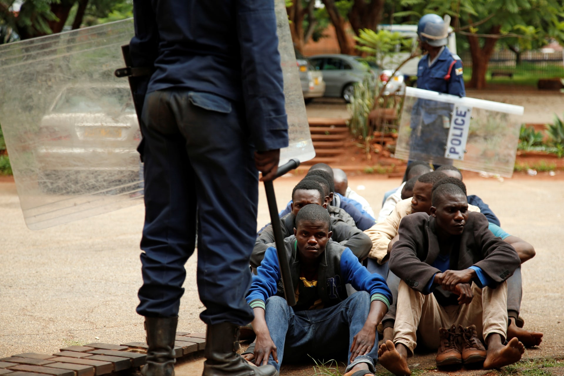 <p>People arrested during protests wait to appear in the Magistrates court in Harare, Zimbabwe, January 16, 2019. </p>