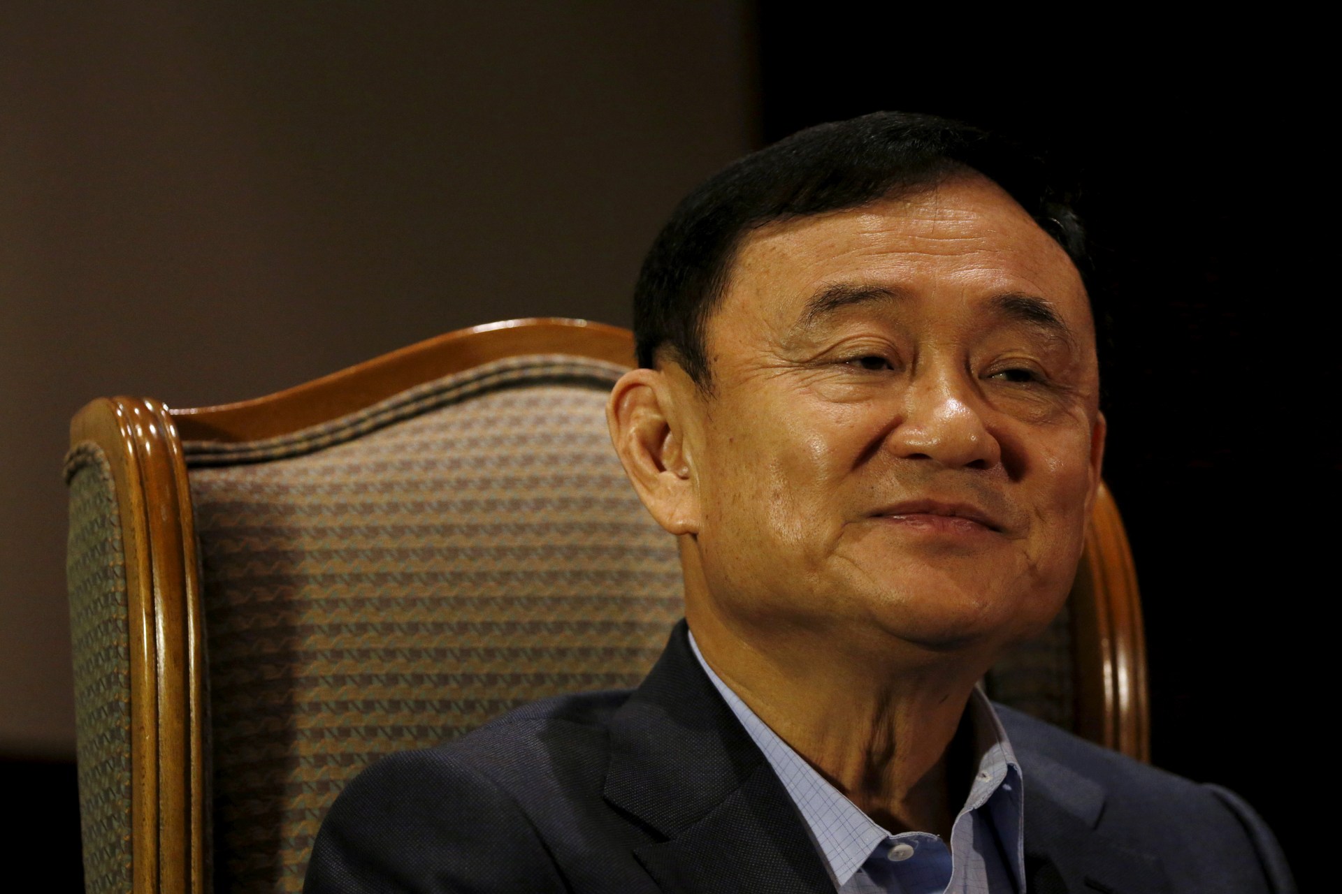 <p>Former Thai Prime Minister Thaksin Shinawatra looks on as he speaks to Reuters during an interview in Singapore on February 23, 2016.</p>
