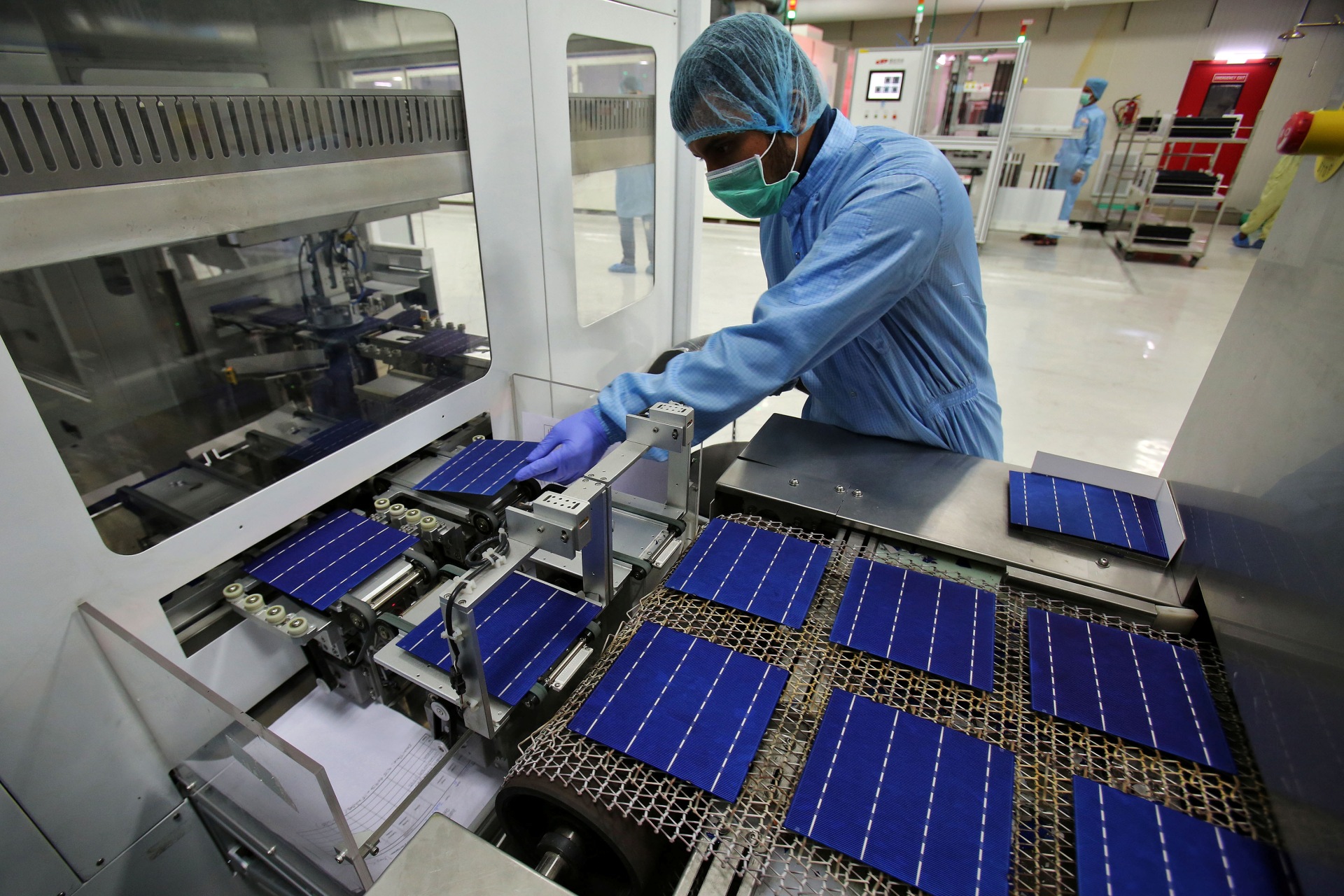 <p>An employee works at a solar cell production line at Jupiter Solar Power Limited (JSPL) plant in Baddi, in the northern state of Himachal Pradesh, India May 29, 2017.</p>
