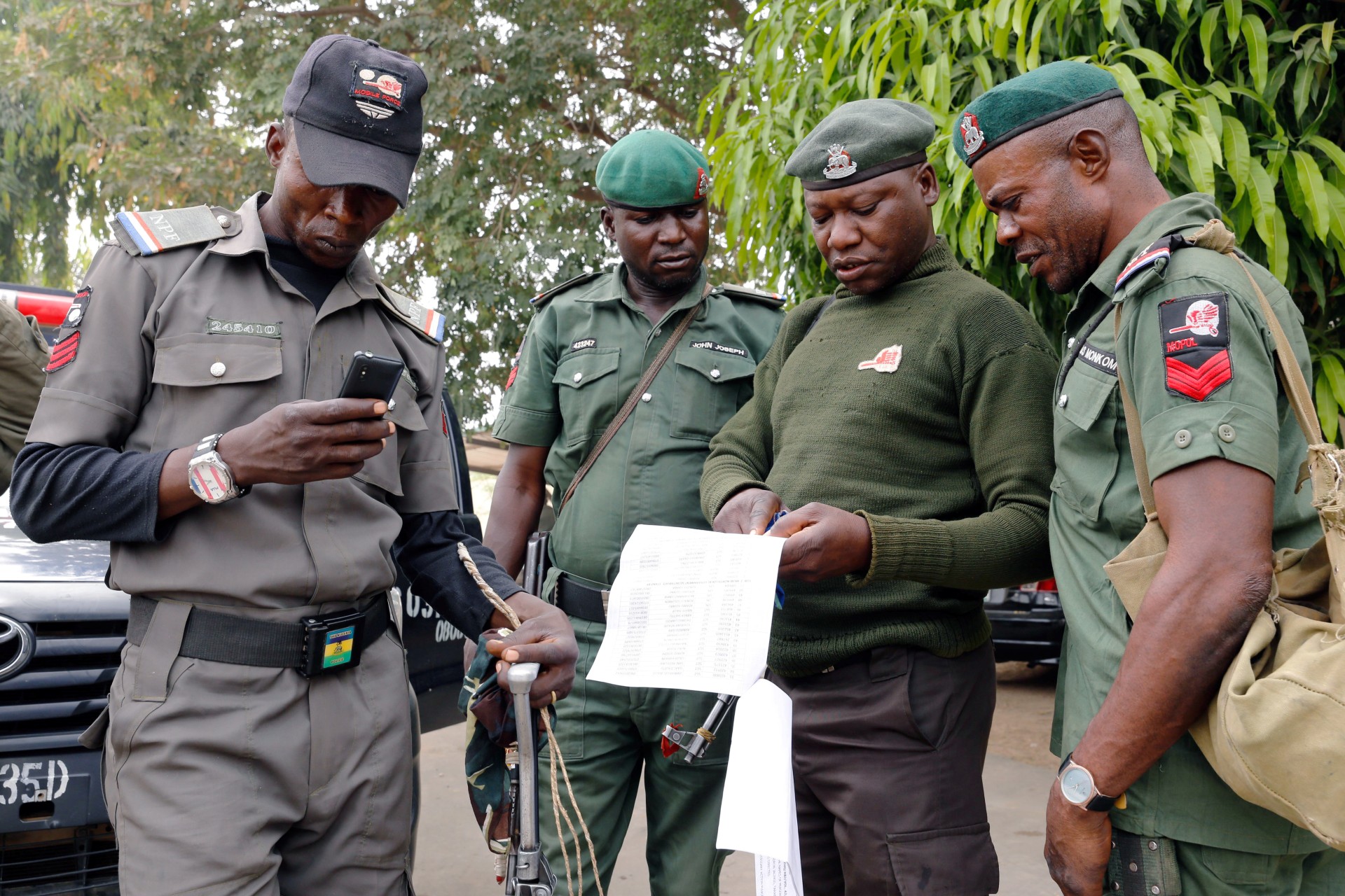 <p>Police officers at the INEC office discuss as they prepare for deployment in Adamawa State, ahead of the country’s presidential election, in Yola, Nigeria, on February 15, 2019. </p>
