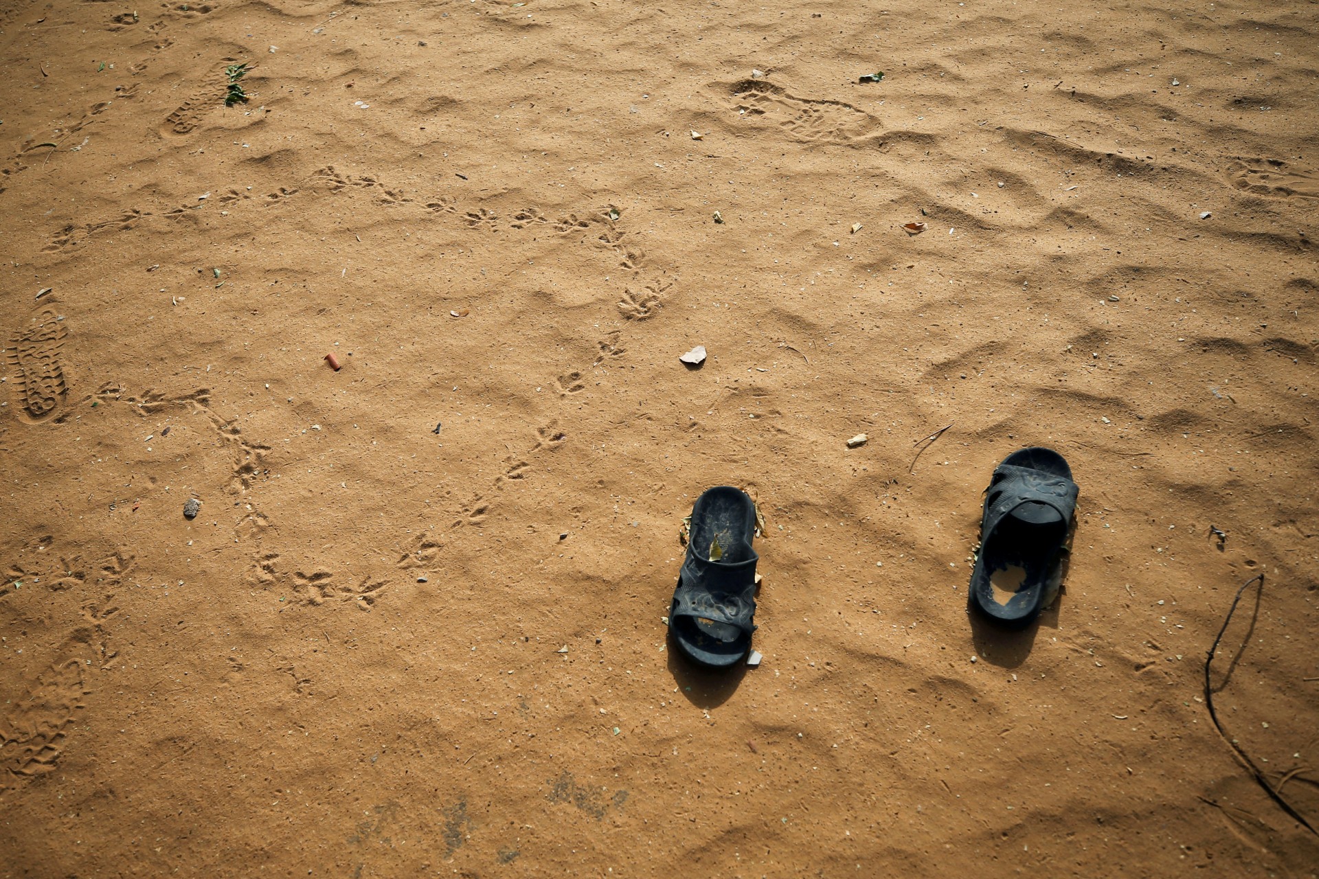 <p>Slippers are pictured at the school compound in Dapchi in the northeastern state of Yobe, where dozens of school girls went missing after an attack on the village by Boko Haram, Nigeria, on February 23, 2018. </p>