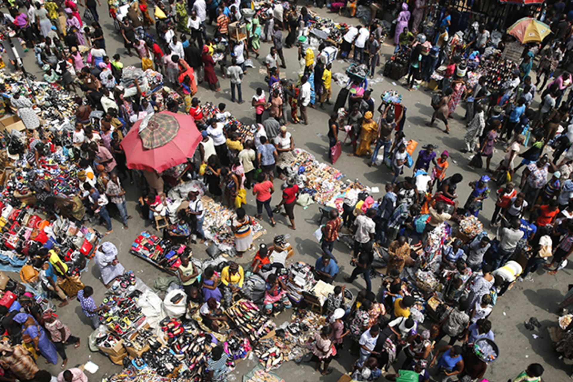 <p>A crowded market square in the Nigerian city of Lagos.</p>
