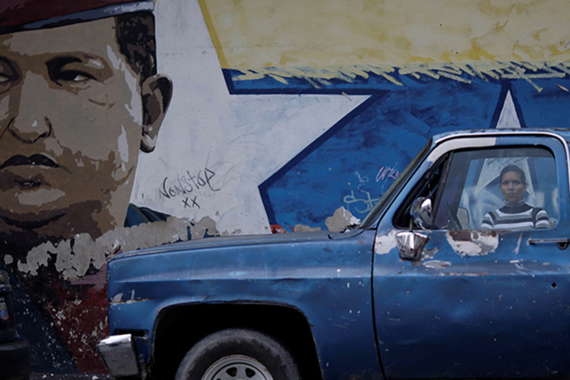 <p>A mural depicts Venezuela’s former president, Hugo Chavez, in the capital, Caracas.</p>
