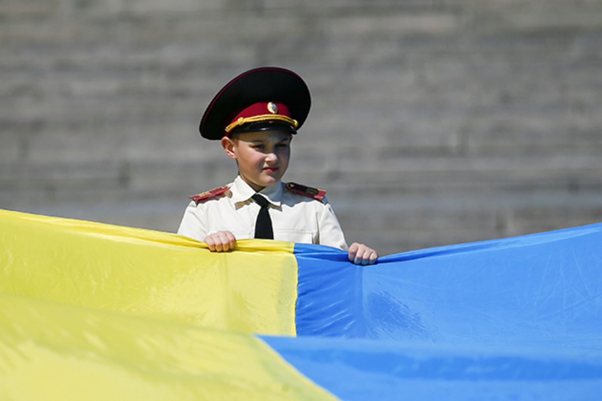 <p>A cadet takes part in a ceremony dedicated to the anniversary of World War II in Kiev.</p>