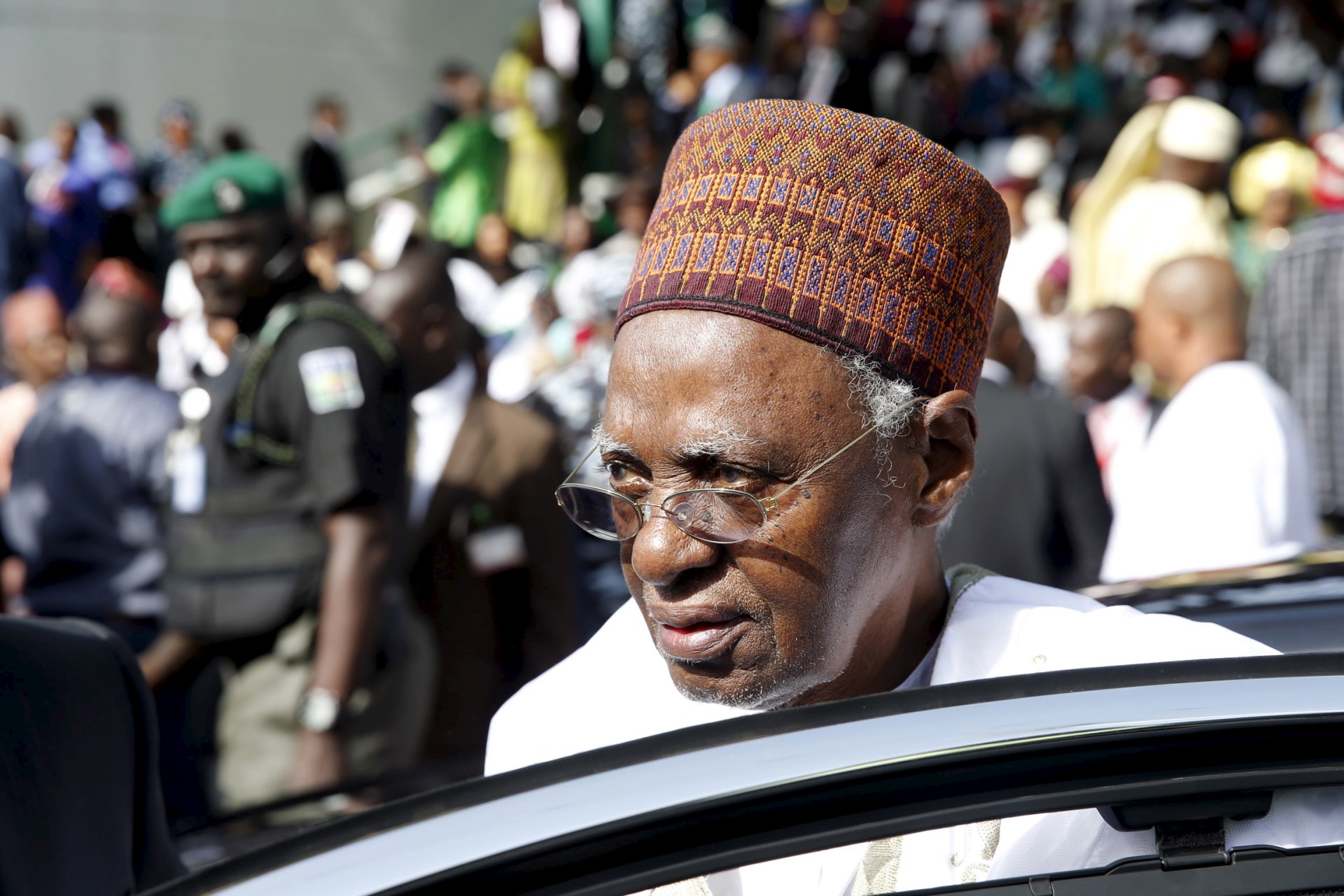 <p>Nigeria’s former President Shehu Shagari arrives for the inauguration ceremony of Nigeria’s President Muhammadu Buhari in Abuja, on May 29, 2015.</p>