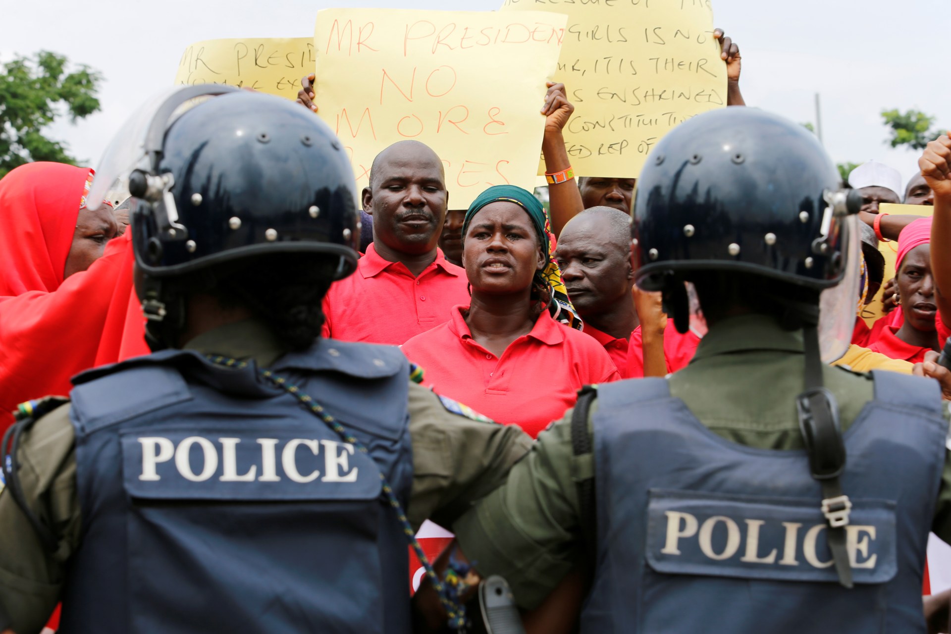 <p>A parent of one of the abducted Chibok school girls cries after the police prevented the parents access to see President Muhammadu Buhari during a rally in Abuja, Nigeria, on August 25, 2016.</p>
