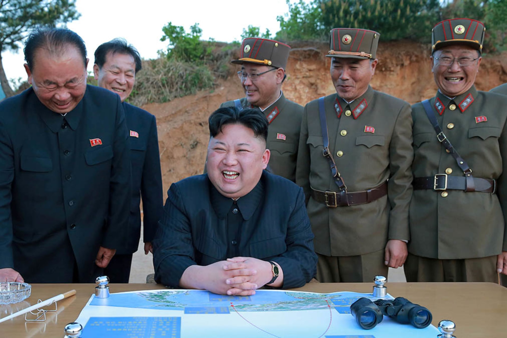 <p>North Korean leader Kim Jong Un reacts during the long-range strategic ballistic rocket test launch.</p>