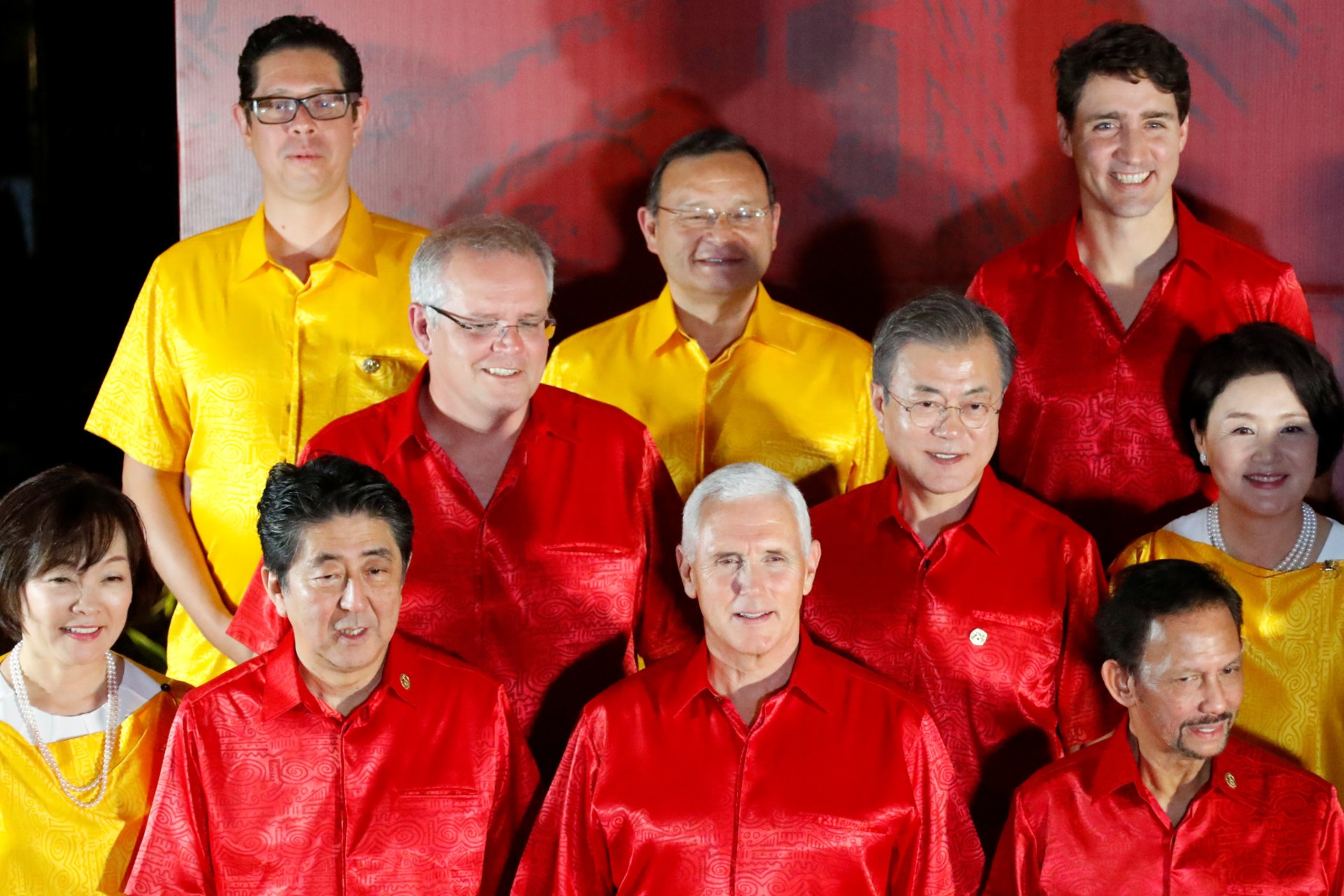 <p>U.S. Vice President Mike Pence poses for a family photo with APEC leaders at at a gala dinner during the APEC Summit in Port Moresby, Papua New Guinea on November 17, 2018.</p>
