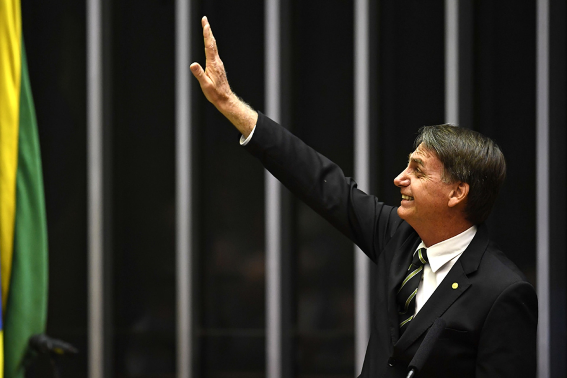 <p>President-Elect Jair Bolsonaro waves inside the Congress building in the capital, Brasilia.</p>