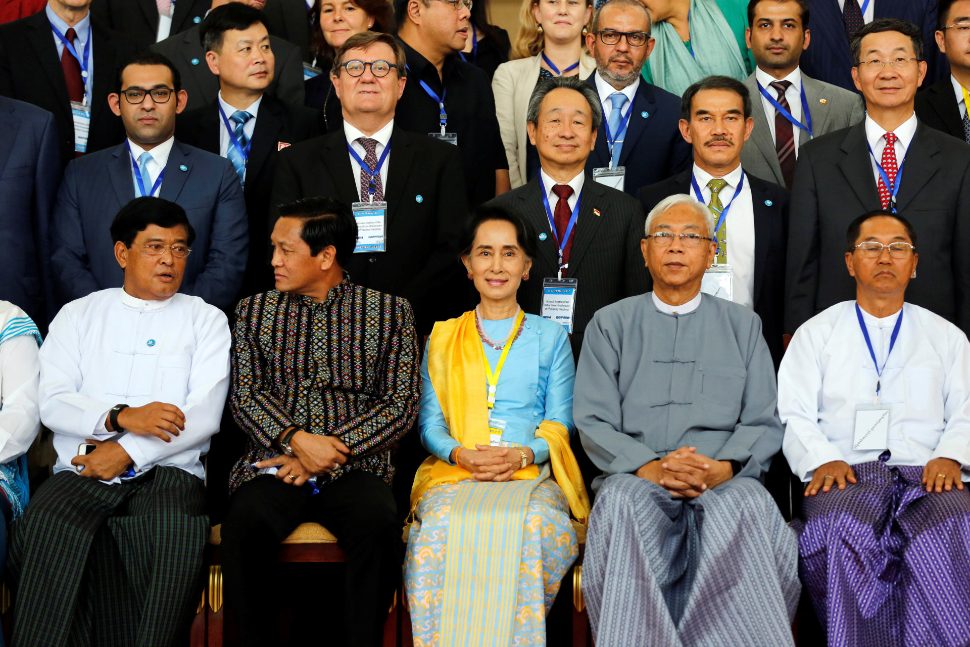 <p>Myanmar State Counselor Aung San Suu Kyi (C) and Myanmar’s president Htin Kyaw (2nd R) pose for photo after opening ceremony of 21st Century Panglong conference in Naypyitaw, Myanmar on May 24, 2017.</p>
