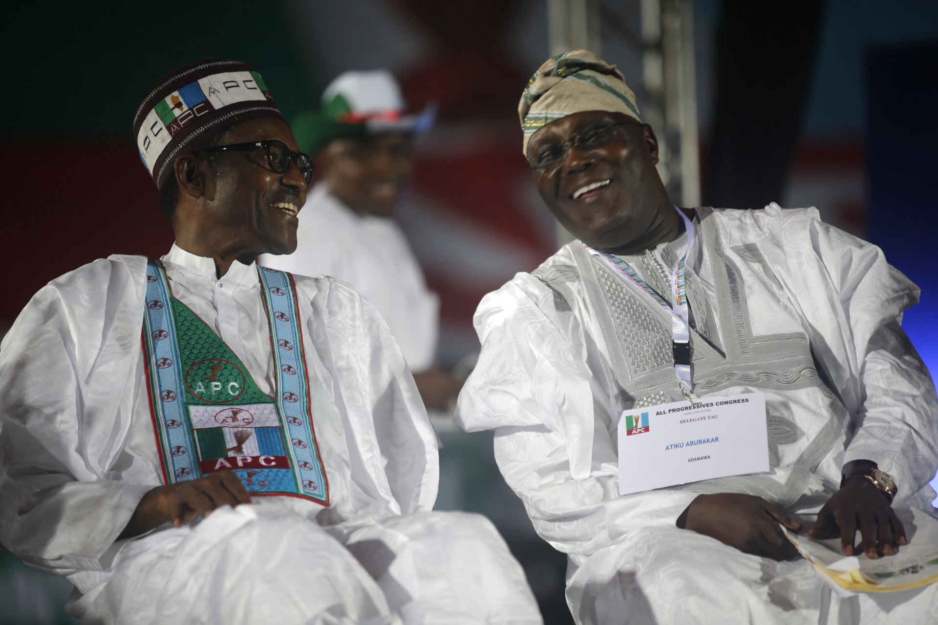 <p>Current PDP presidential candidate Atiku Abubakar speaks with current President Muhammadu Buhari of the APC in Lagos on December 11, 2014, when both were contesting for the APC presidential nomination.</p>
