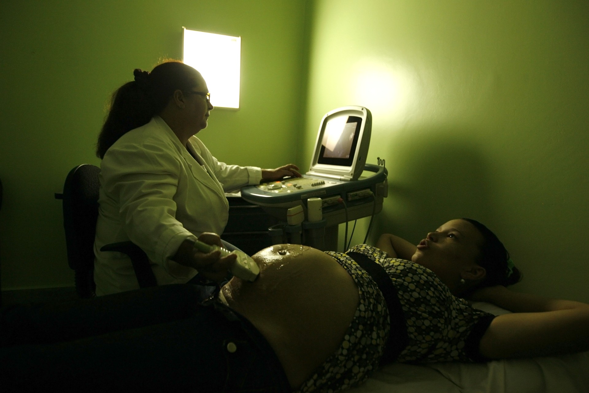 <p>Pregnant patient Angelica Martinez is checked by a doctor at a health program in Caracas.</p>
