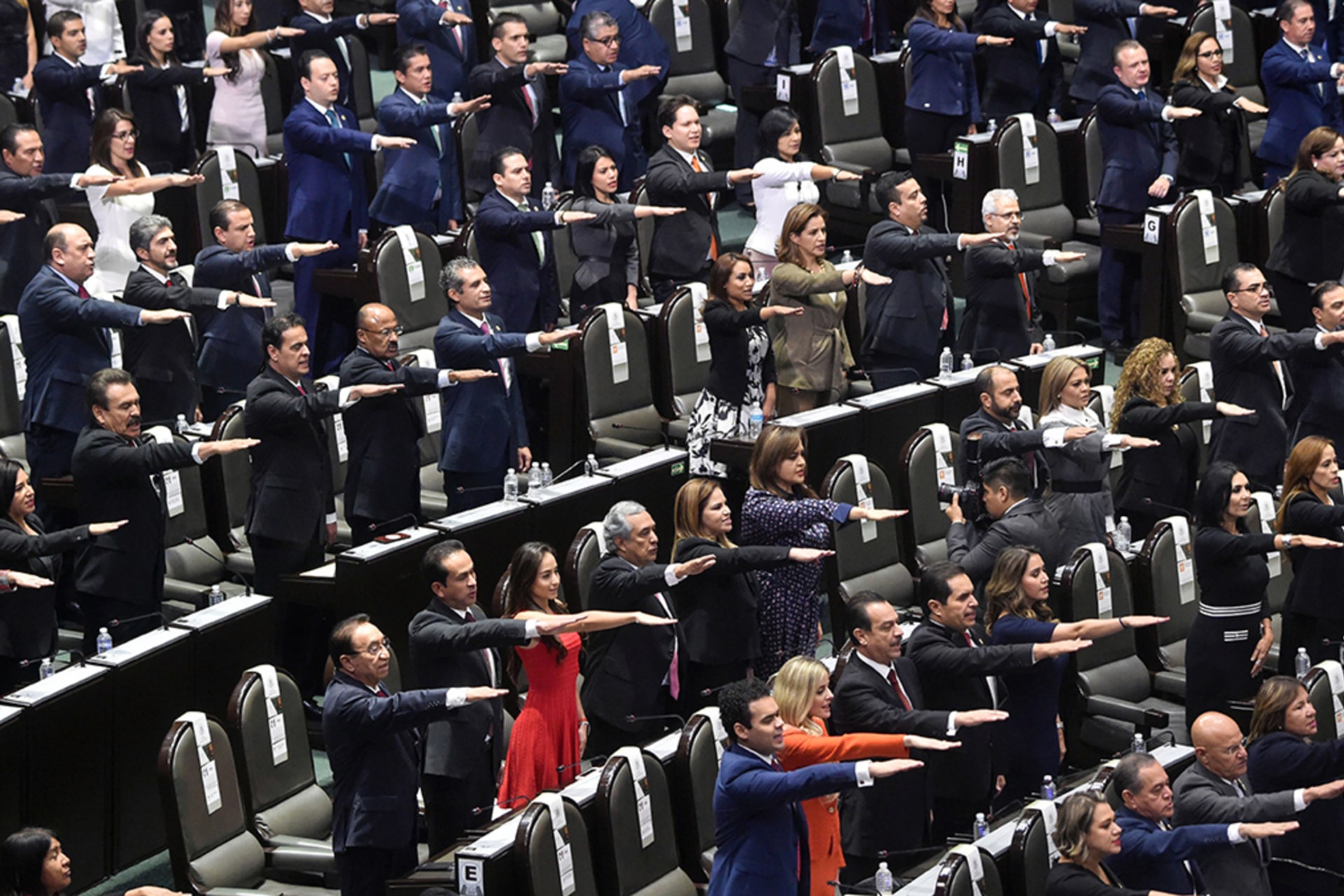 <p>Mexican deputies swear in, during the inauguration of the new legislature at the Congress in Mexico City, on August 29, 2018.</p>
