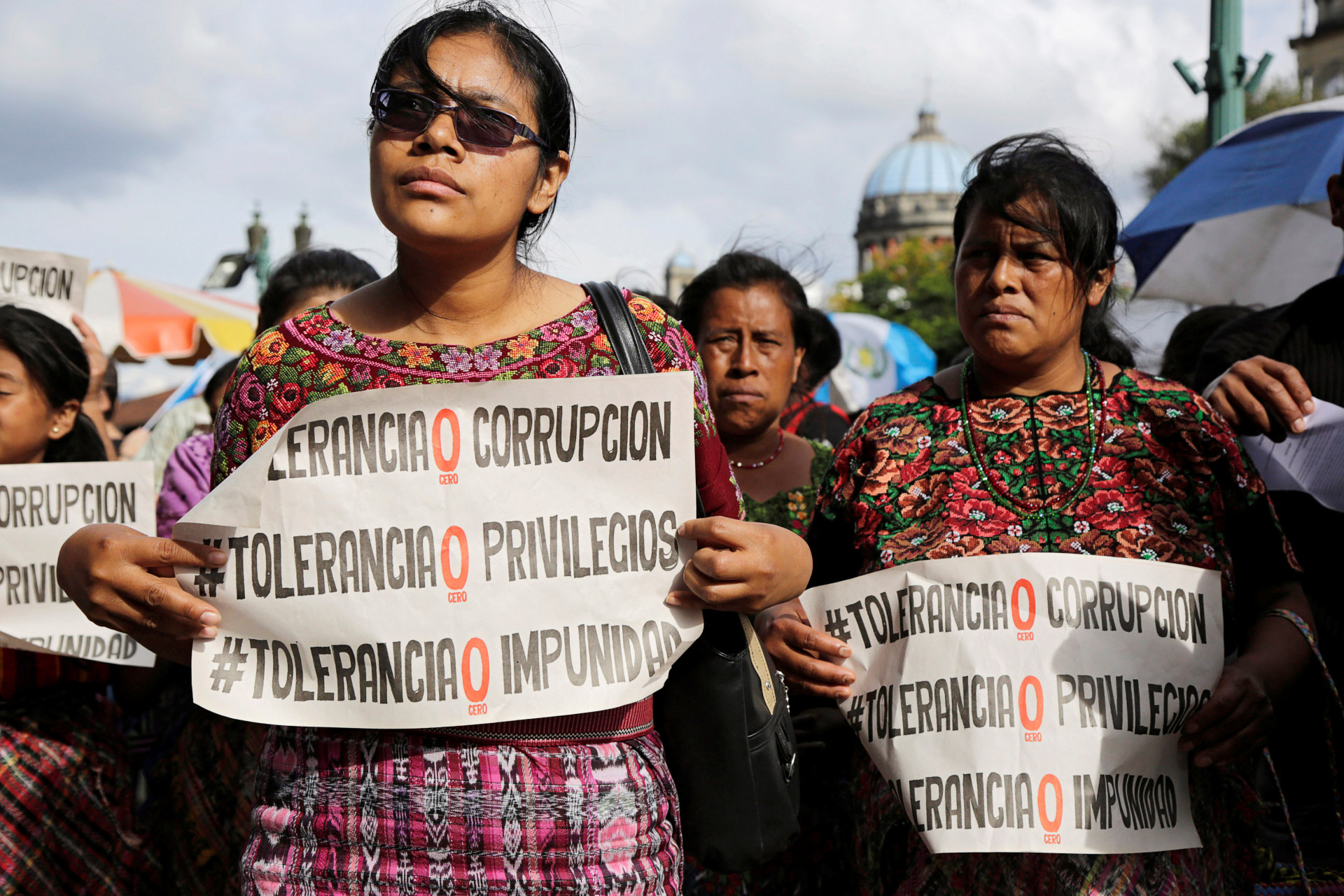 <p>Indigenous women protest in front of the National Palace in Guatemala City, Guatemala. The signs read, “Tolerance 0 Corruption. Tolerance 0 privileges. Tolerance 0 Impunity”</p>
