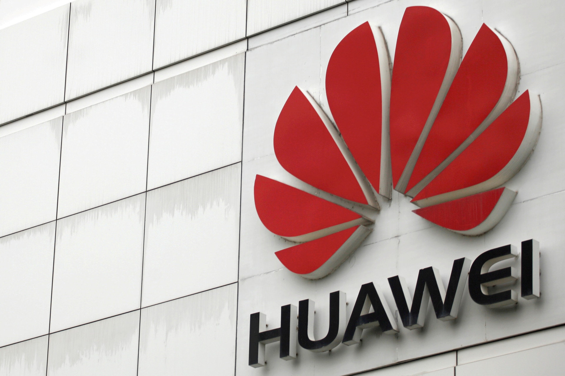 <p>The logo of the Huawei Technologies Co. Ltd. is seen outside its headquarters in Shenzhen, China on April 17, 2012.</p>
