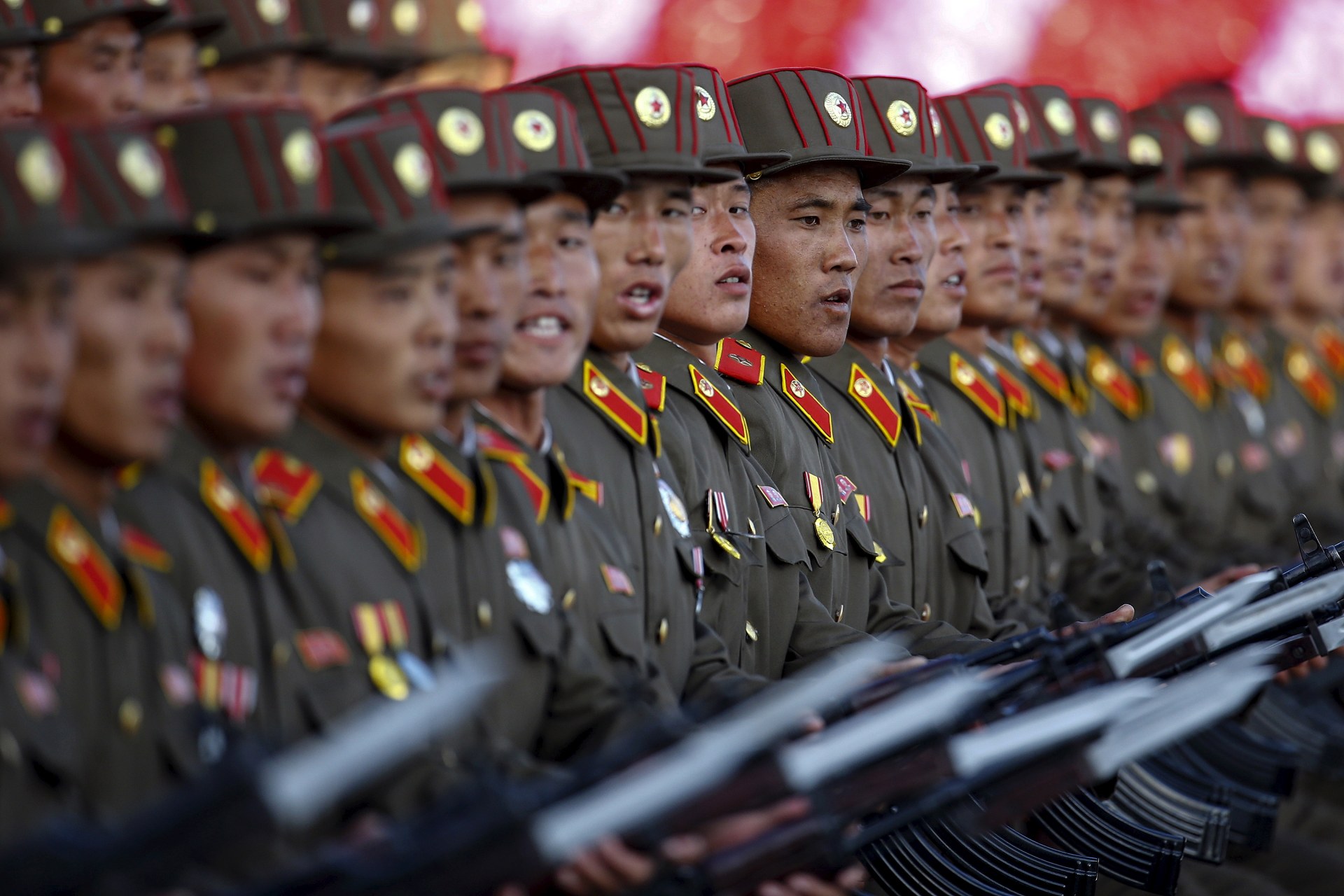 <p>North Korean soldiers participate in a military parade overseen by the country’s leader, Kim Jong-un, in Pyongyang on October 10, 2015.</p>