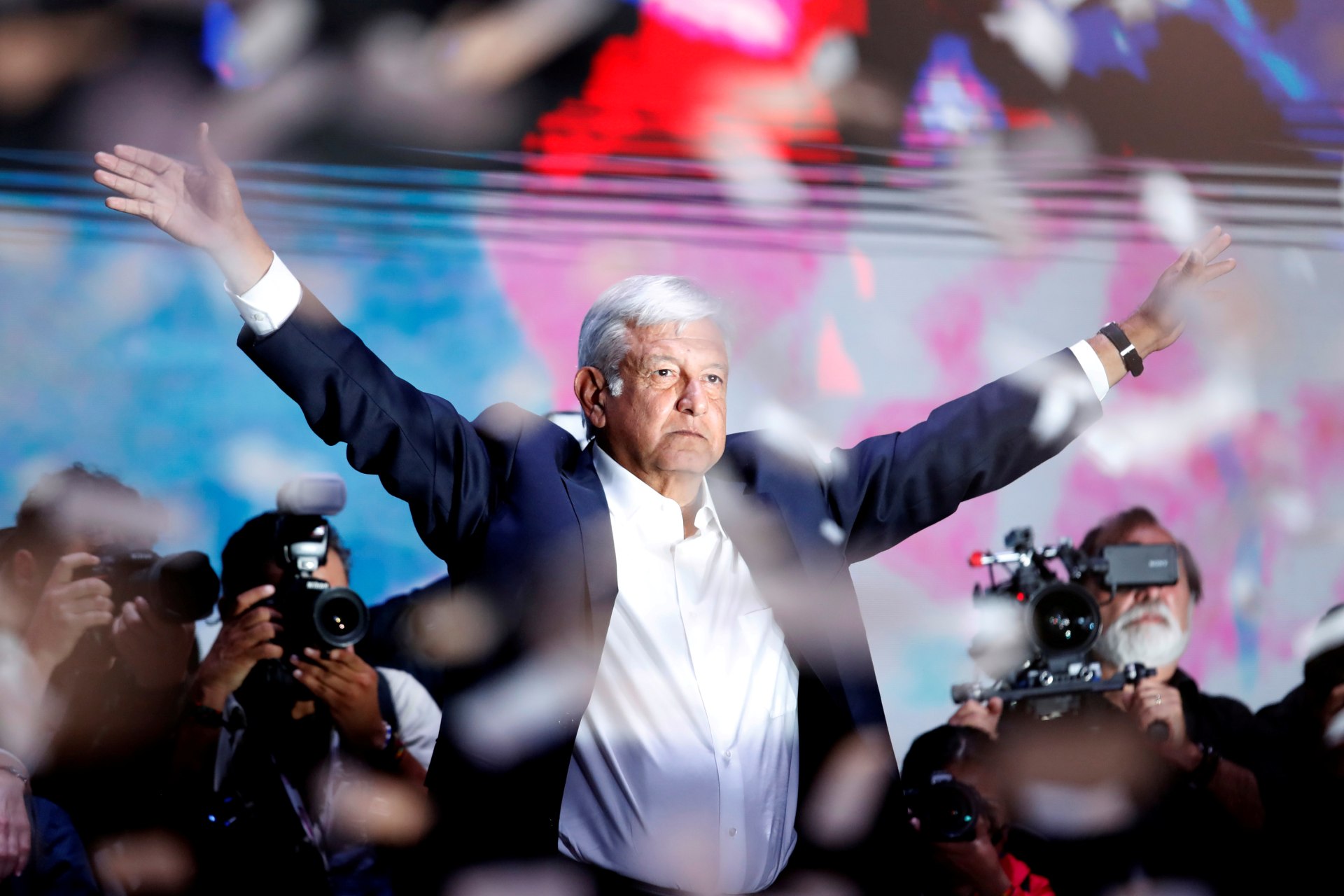 <p>Presidential candidate Andres Manuel Lopez Obrador gestures as he addresses supporters after polls closed in the presidential election, in Mexico City, Mexico July 2, 2018. </p>
