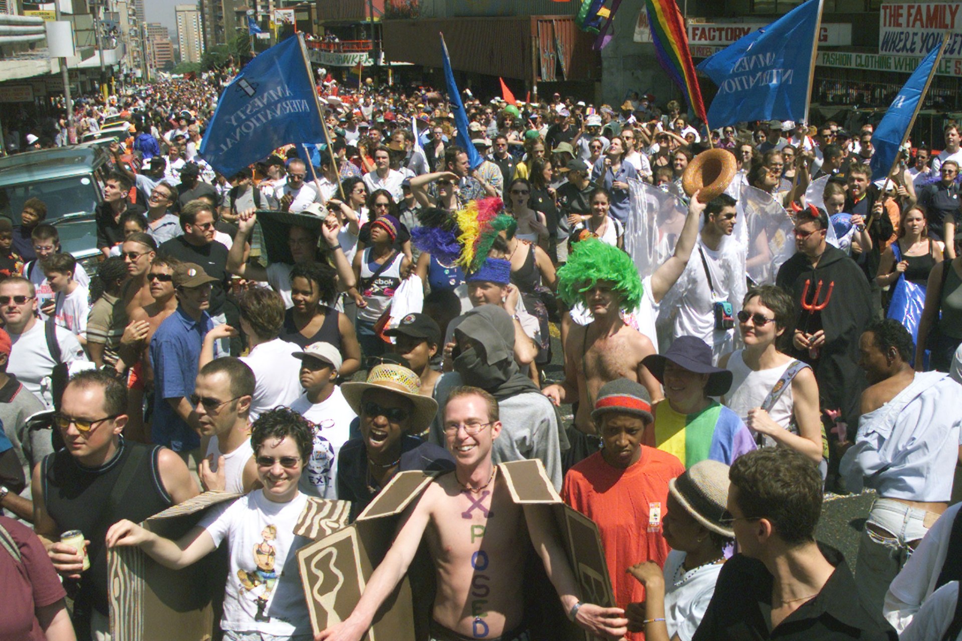 <p>Nearly 30,000 bisexuals, gays lesbians and other allies of diversity march 10 km (6 miles) through the streets of downtown Johannesburg on September 25, 1999, to commemorate the country’s 10th Pride Parade.</p>
