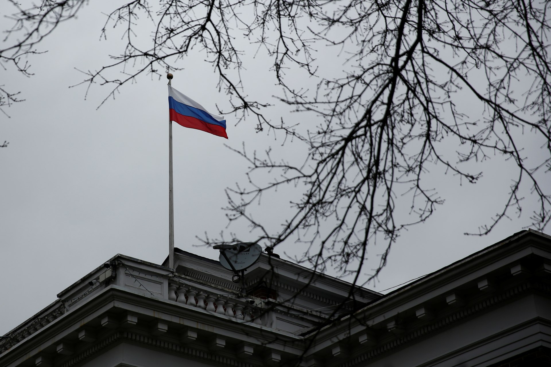 <p>A Russian flag flies atop the Consulate General of the Russian Federation in Seattle on March 26, 2018.</p>

