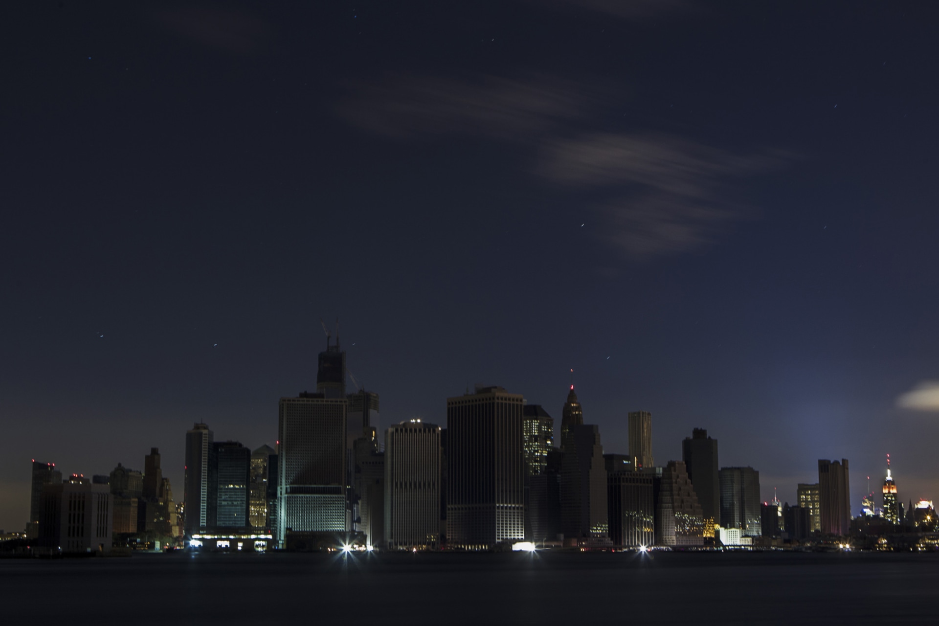 <p>A largely powerless downtown Manhattan stands under a night sky due to a power blackout caused by Hurricane Sandy in New York October 31, 2012.</p>