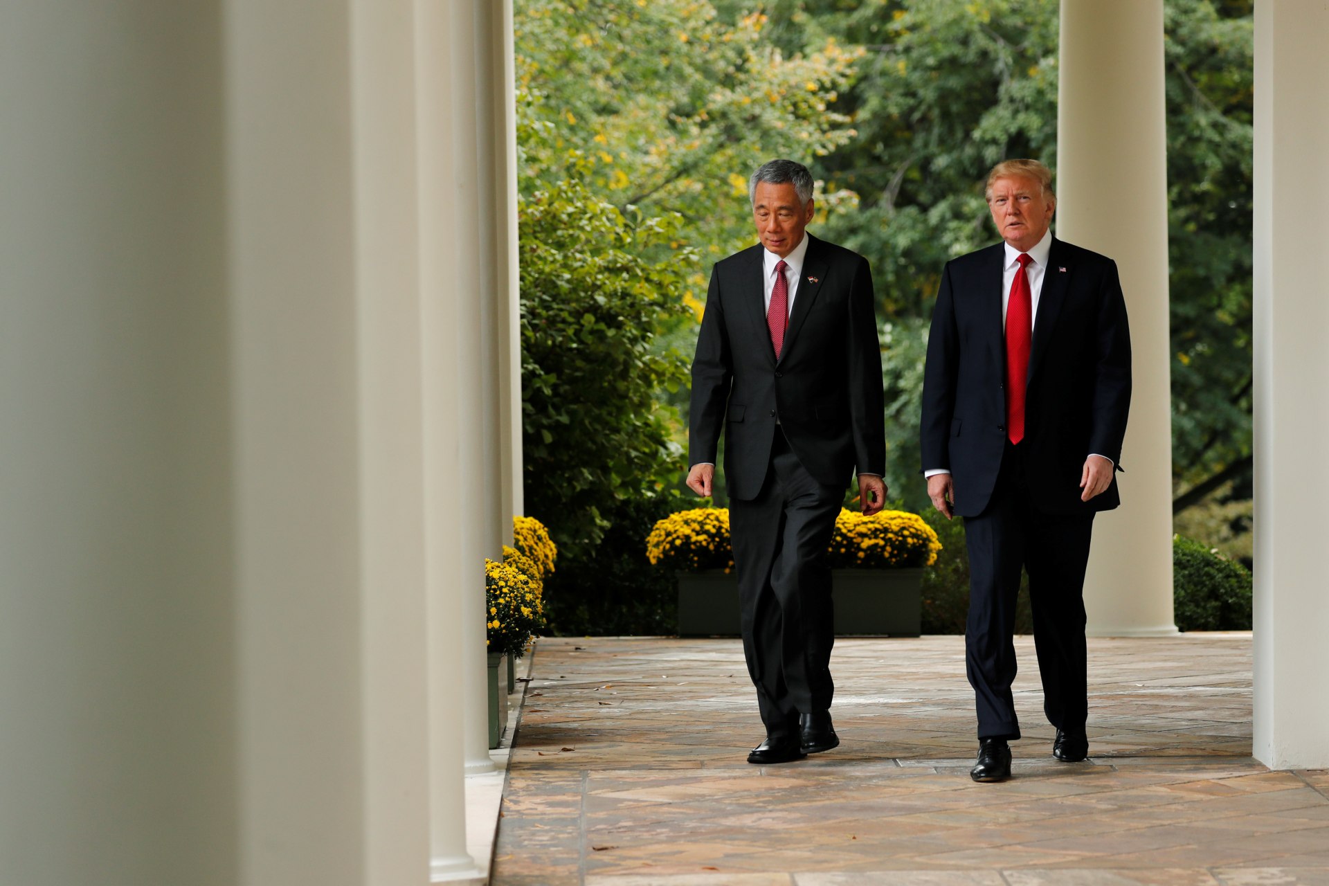 <p>U.S. President Donald J. Trump and Singapore’s Prime Minister Lee Hsien Loong walk out to deliver joint statements to reporters at the White House in Washington, DC on October 23, 2017.</p>