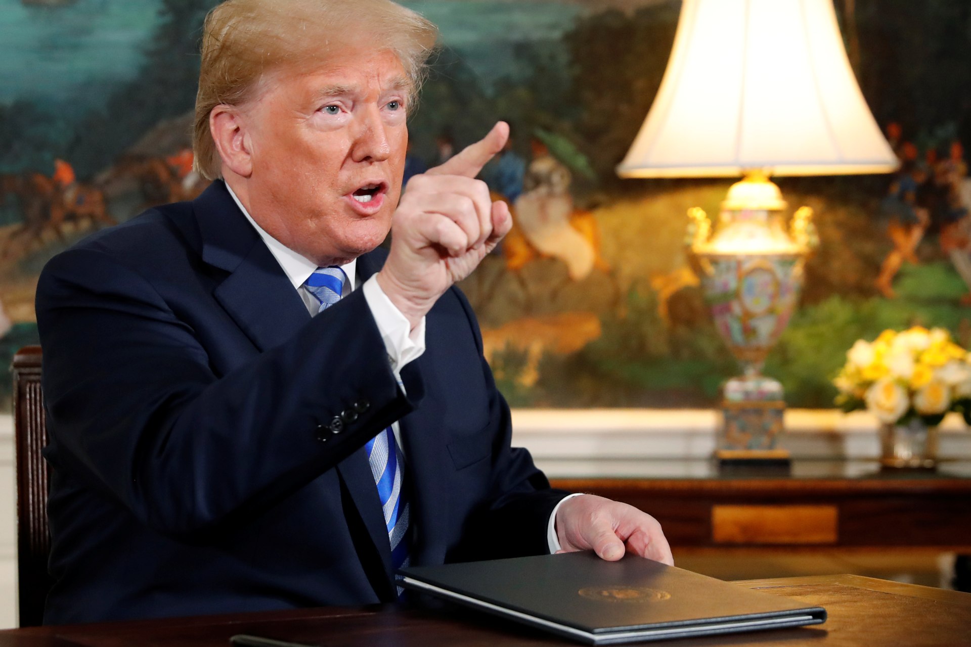 <p>U.S. President Donald Trump speaks to reporters after signing a proclamation declaring his intention to withdraw from the JCPOA Iran nuclear agreement in the Diplomatic Room at the White House in Washington, U.S. May 8, 2018.</p>