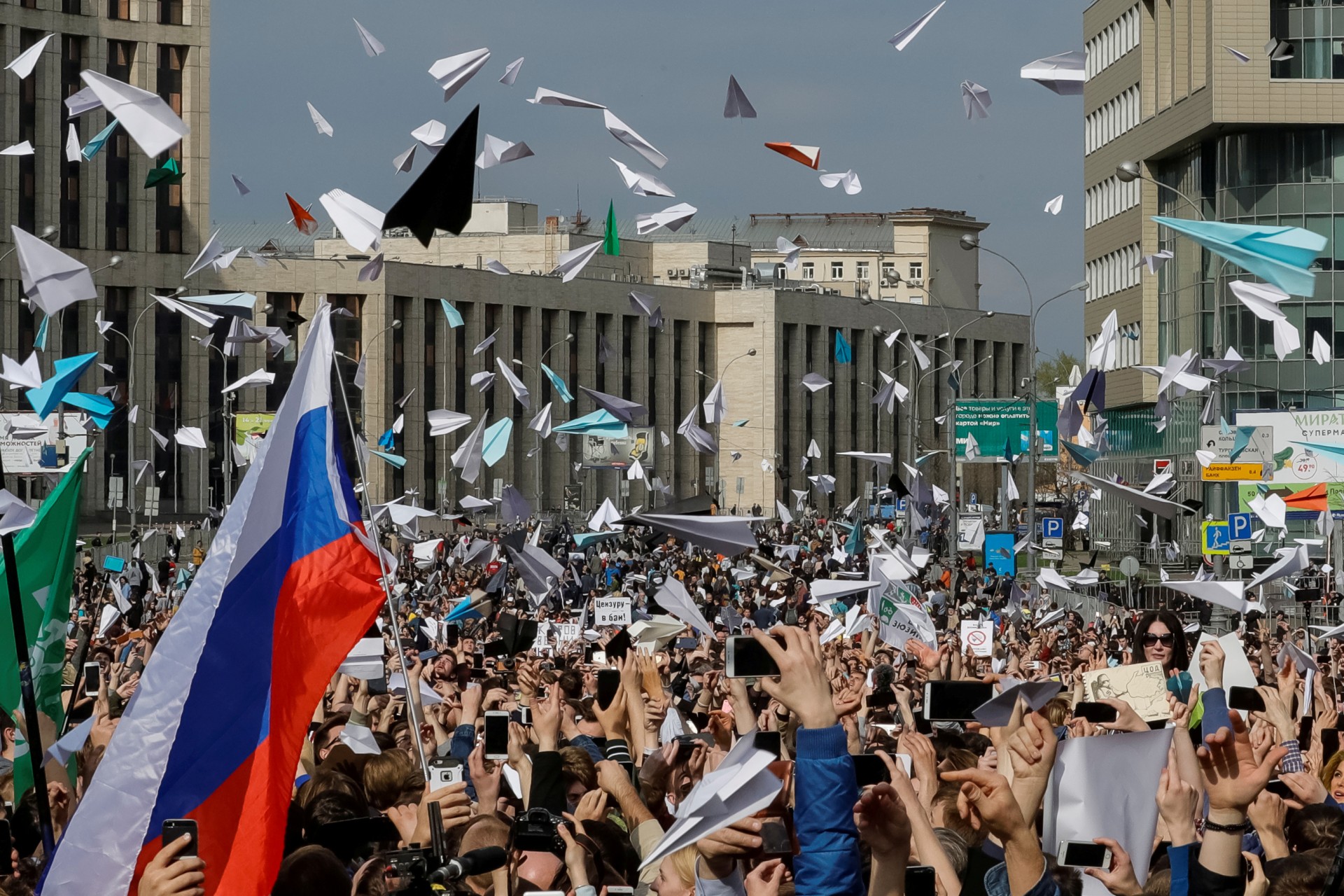 <p>People release paper planes, symbol of the Telegram messenger, during a rally in protest against court decision to block the messenger because it violated Russian regulations, in Moscow, Russia on April 30, 2018.</p>

