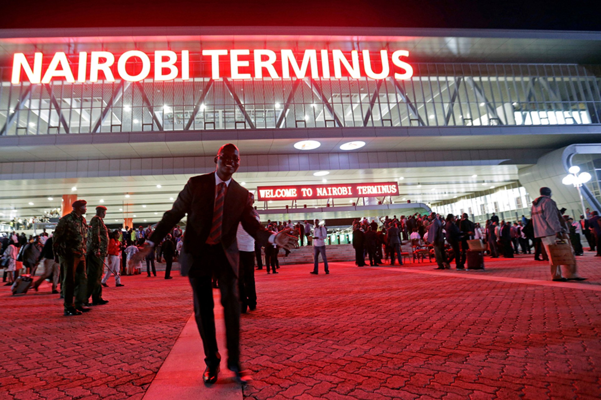 <p>Passengers who arrived in a train launched to operate on a railway line constructed by the China Road and Bridge Corporation and financed by Chinese government are seen outside the Nairobi Terminus, Nairobi, Kenya, on May 31, 2017.</p>
