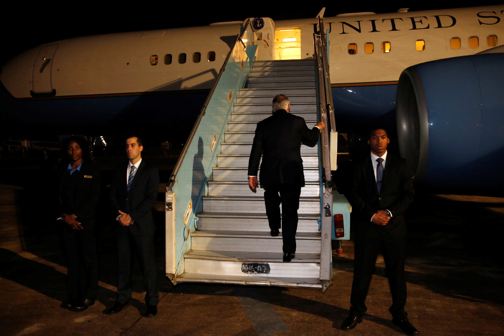 <p>U.S. Secretary of State Rex Tillerson boards his plane to depart at the end of a five-country swing through Africa from Abuja, Nigeria, March 12, 2018. </p>
