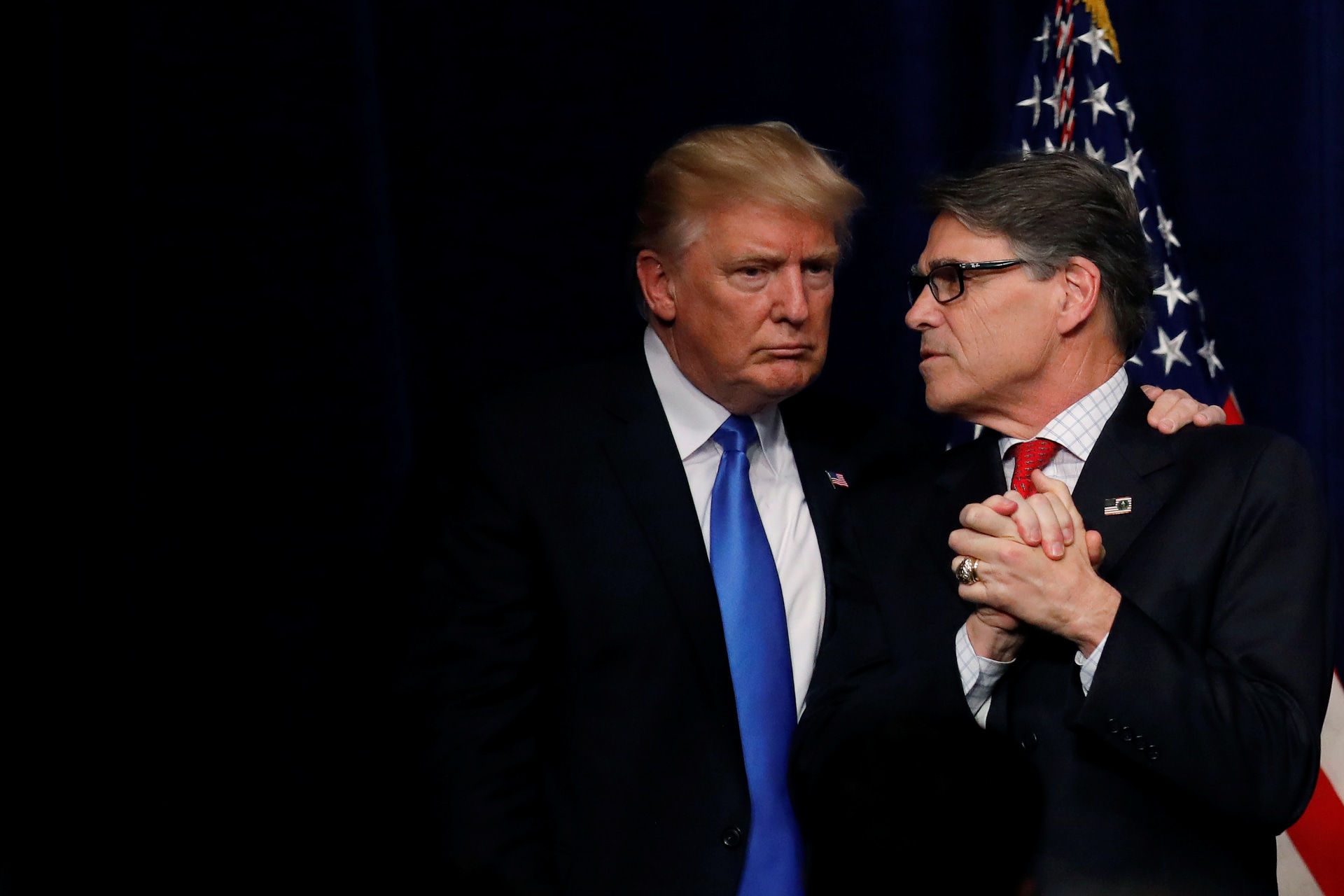 <p>U.S. President Donald Trump talks with Energy Secretary Rick Perry after delivering remarks during an “Unleashing American Energy” event at the Department of Energy in Washington, U.S., June 29, 2017. </p>