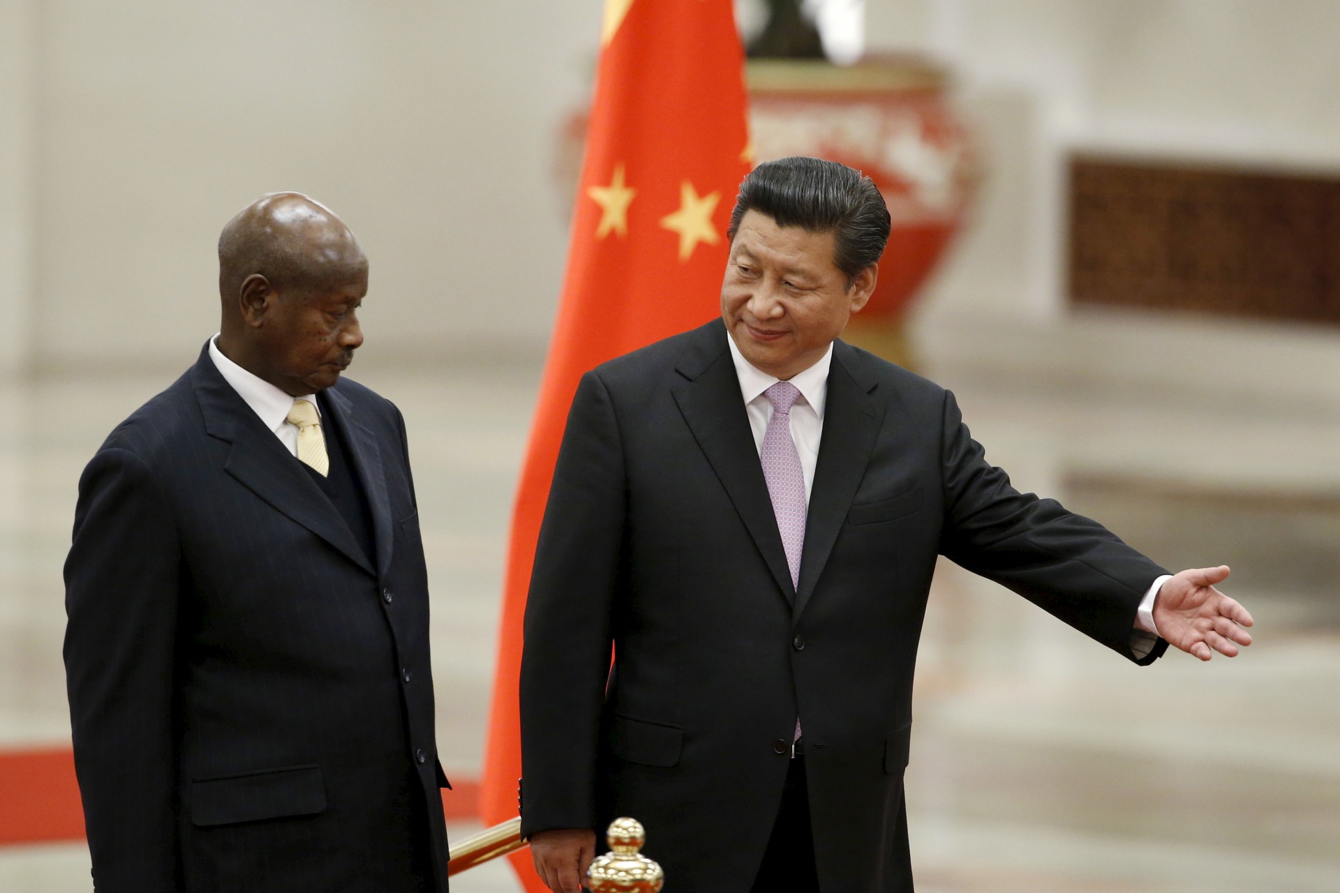 <p>Ugandan President Yoweri Museveni and Chinese President Xi Jinping attend a welcoming ceremony at the Great Hall of the People in Beijing, March 31, 2015. Museveni has been in power since 1986 and oversaw the removal of presidential term and age limits.</p>
