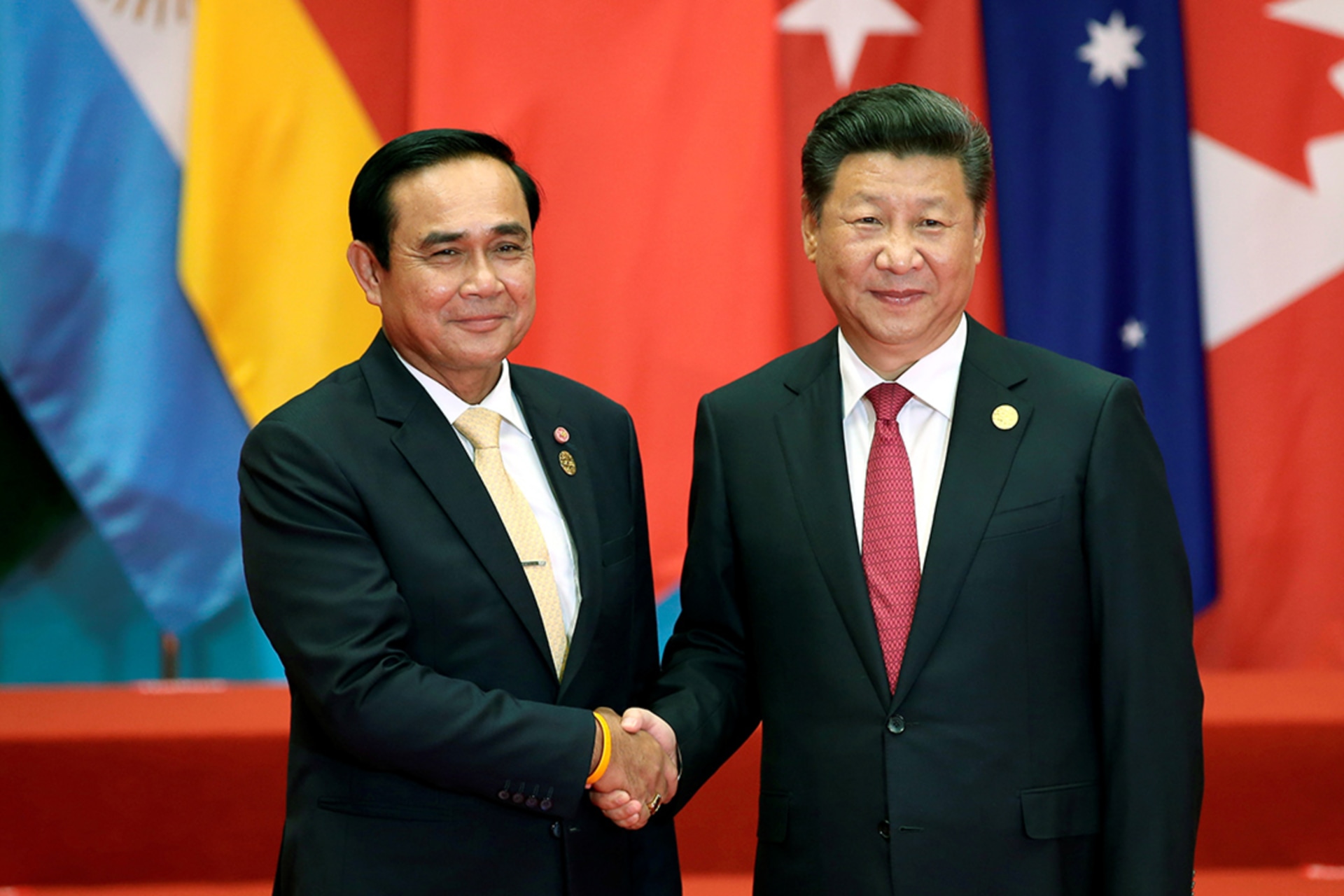 <p>China’s President Xi Jinping shakes hands with Thailand’s Prime Minister Prayuth Chan-ocha during the G20 Summit in Hangzhou, Zhejiang province, China, on September 4, 2016.</p>
