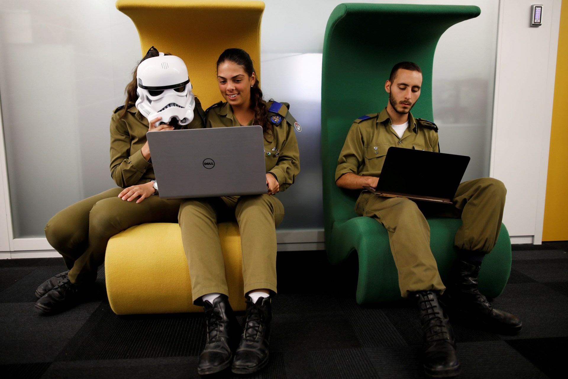 <p>Israeli soldiers work on laptops as they take part in a cyber security training course in August 2017. </p>