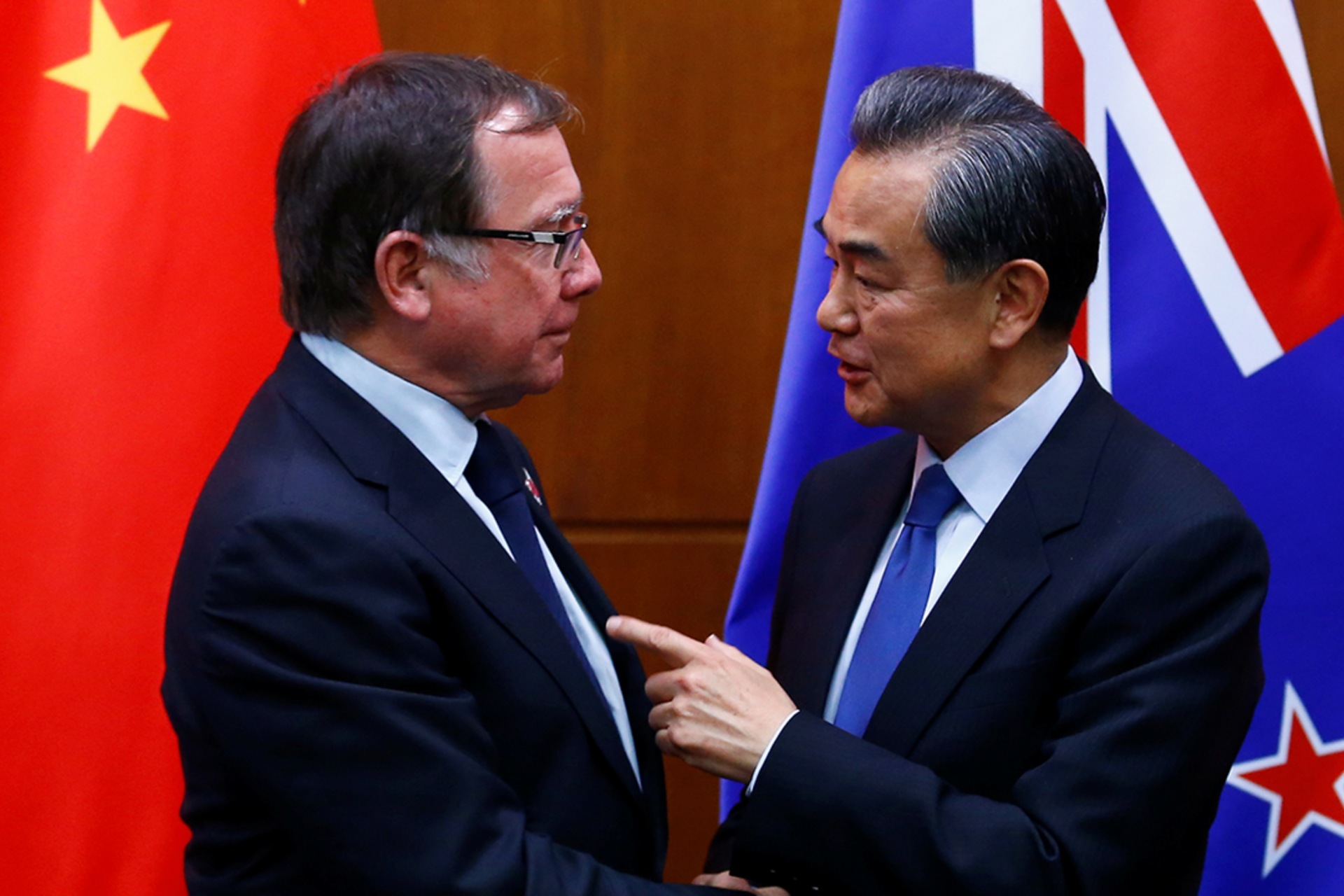 <p>Chinese Foreign Minister Wang Yi (R) and New Zealand’s Foreign Minister Murray McCully attend a news conference after talks in Beijing, China, on October 18, 2016.</p>
