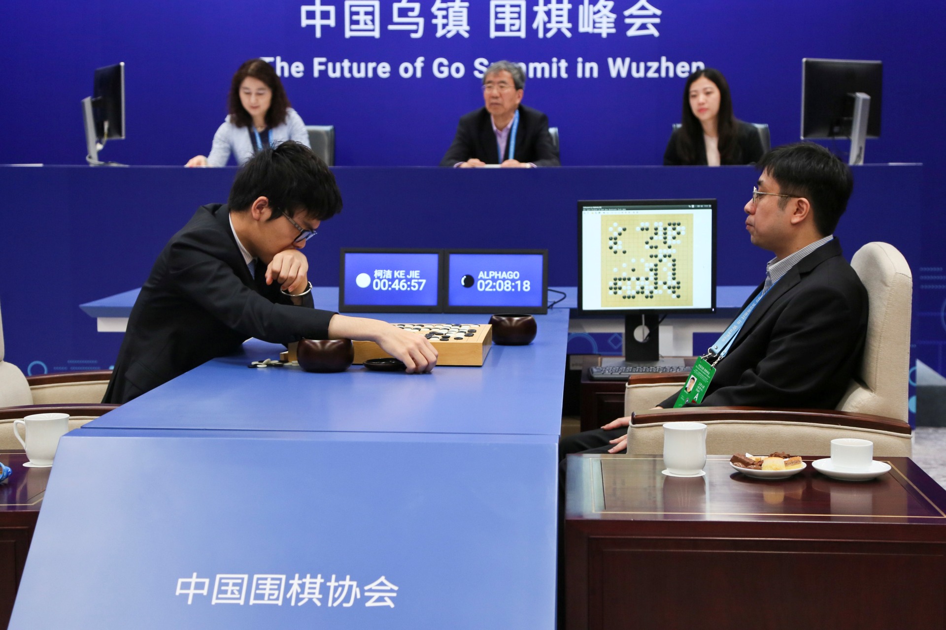<p>Chinese Go player Ke Jie (left) competes against Google’s artificial intelligence program AlphaGo during their second match at the Future of Go Summit in Wuzhen, China in May 2017.</p>

