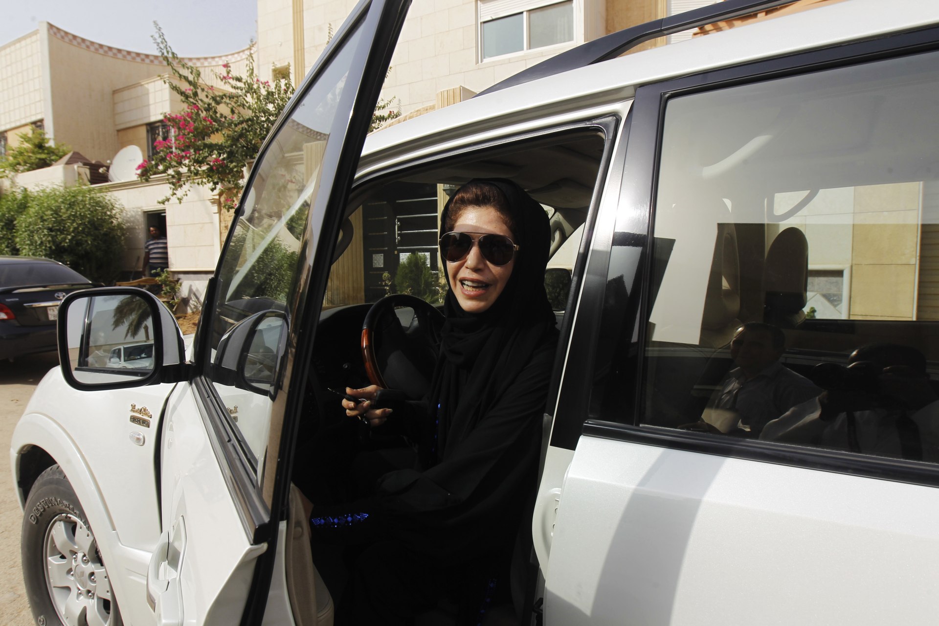 <p>Female driver Azza Al Shmasani steps from her car after driving in defiance of the ban in Riyadh June 22, 2011.</p>