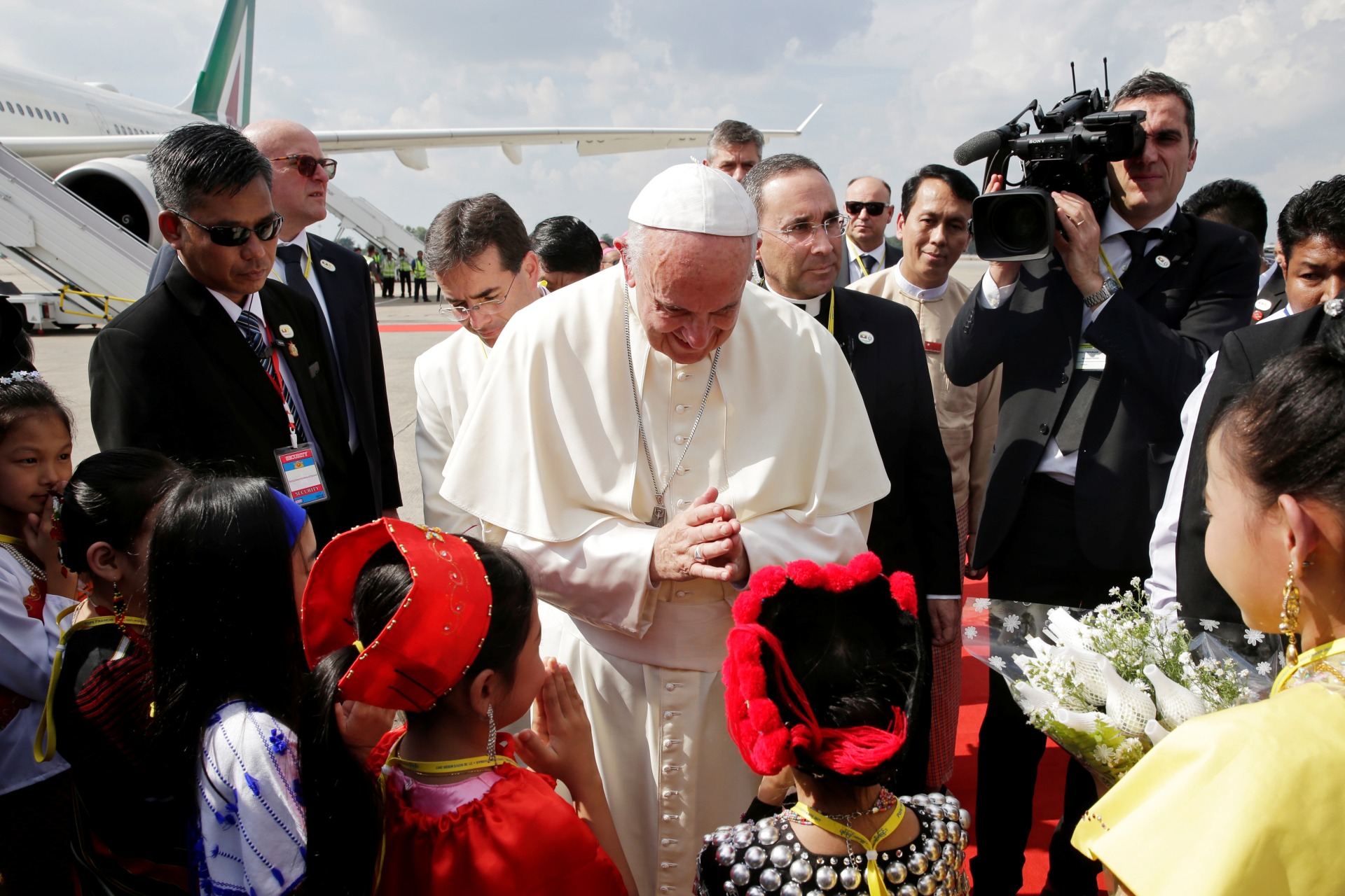 <p>Pope Francis is welcomed as he arrives at Yangon International Airport, Myanmar on November 27, 2017.</p>