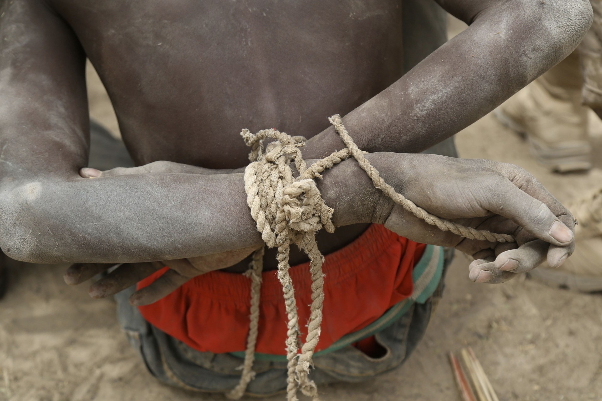 <p>A prisoner, suspected of being a member of insurgent group Boko Haram, in the field base of Chadian soldiers in Gambaru, Nigeria, February 26, 2015. Thousands of others have been arrested and detained indefinitely in the fight against the terrorist group.</p>

