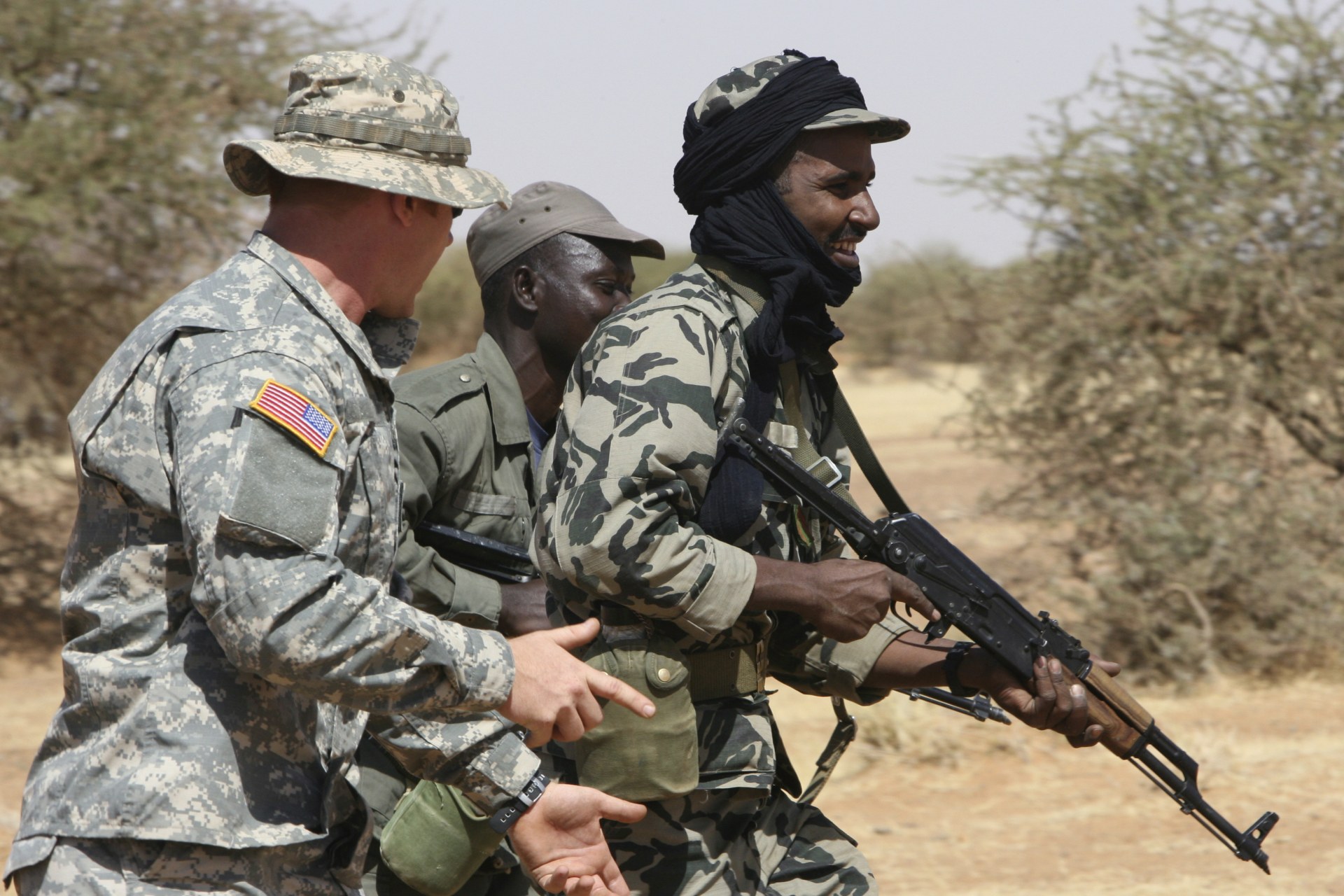 <p>A U.S. soldier directs Malian soldiers while training in Gao, eastern Mali, on November 13, 2006. The Trans-Sahara Counterterrorism Partnership also includes Algeria, Burkina Faso, Cameroon, Chad, Mauritania, Morocco, Niger, Nigeria, Senegal, and Tunisia.</p>
