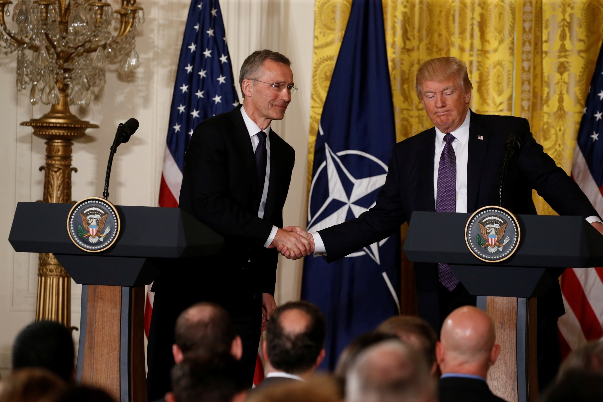 <p>U.S. President Donald Trump and NATO Secretary-General Jens Stoltenberg shake hands during a joint news conference on April 12, 2017. </p>
