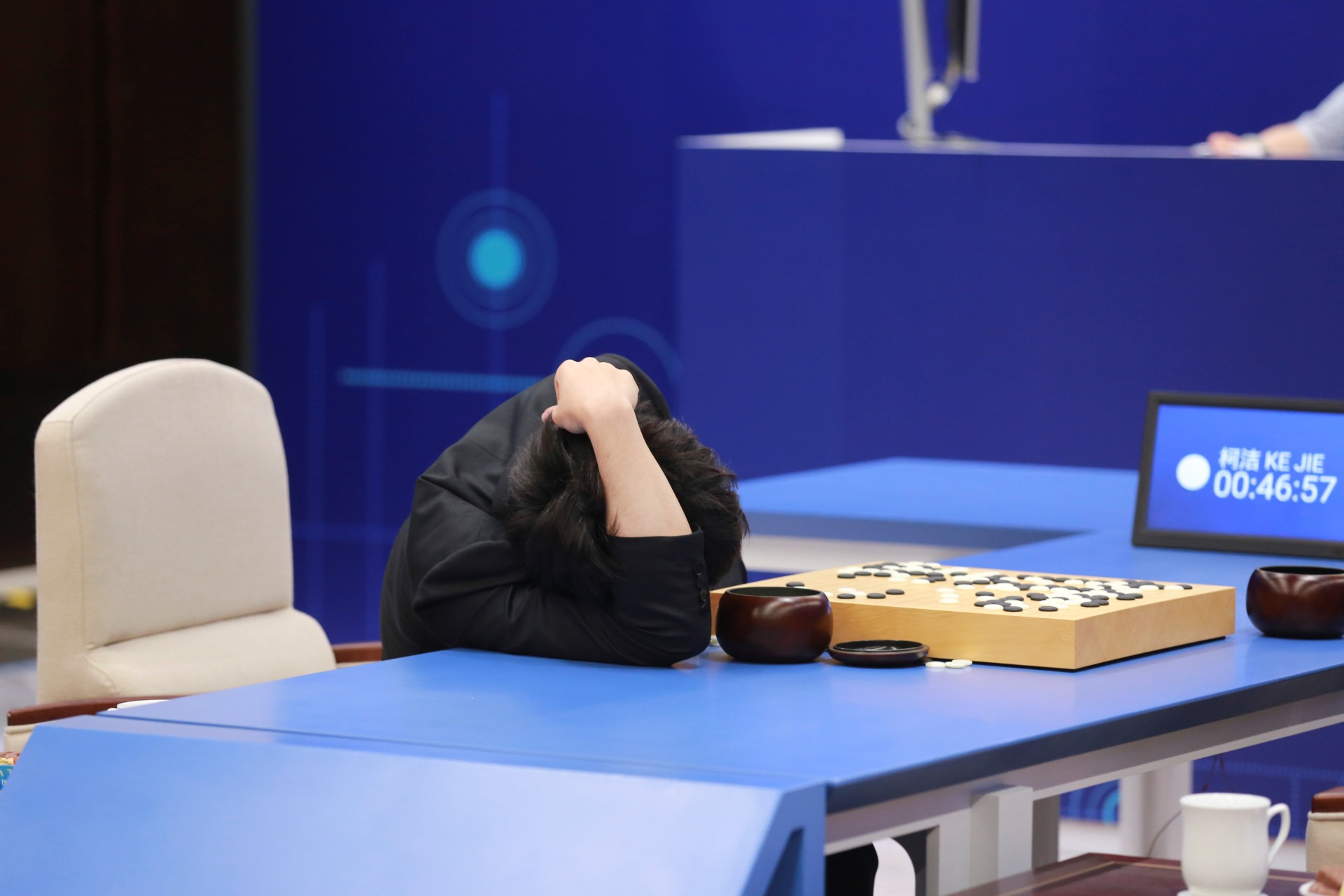 <p>Chinese Go player Ke Jie reacts during his second match against Google’s artificial intelligence program AlphaGo at the Future of Go Summit in Wuzhen, Zhejiang province, China May 25, 2017. </p>
