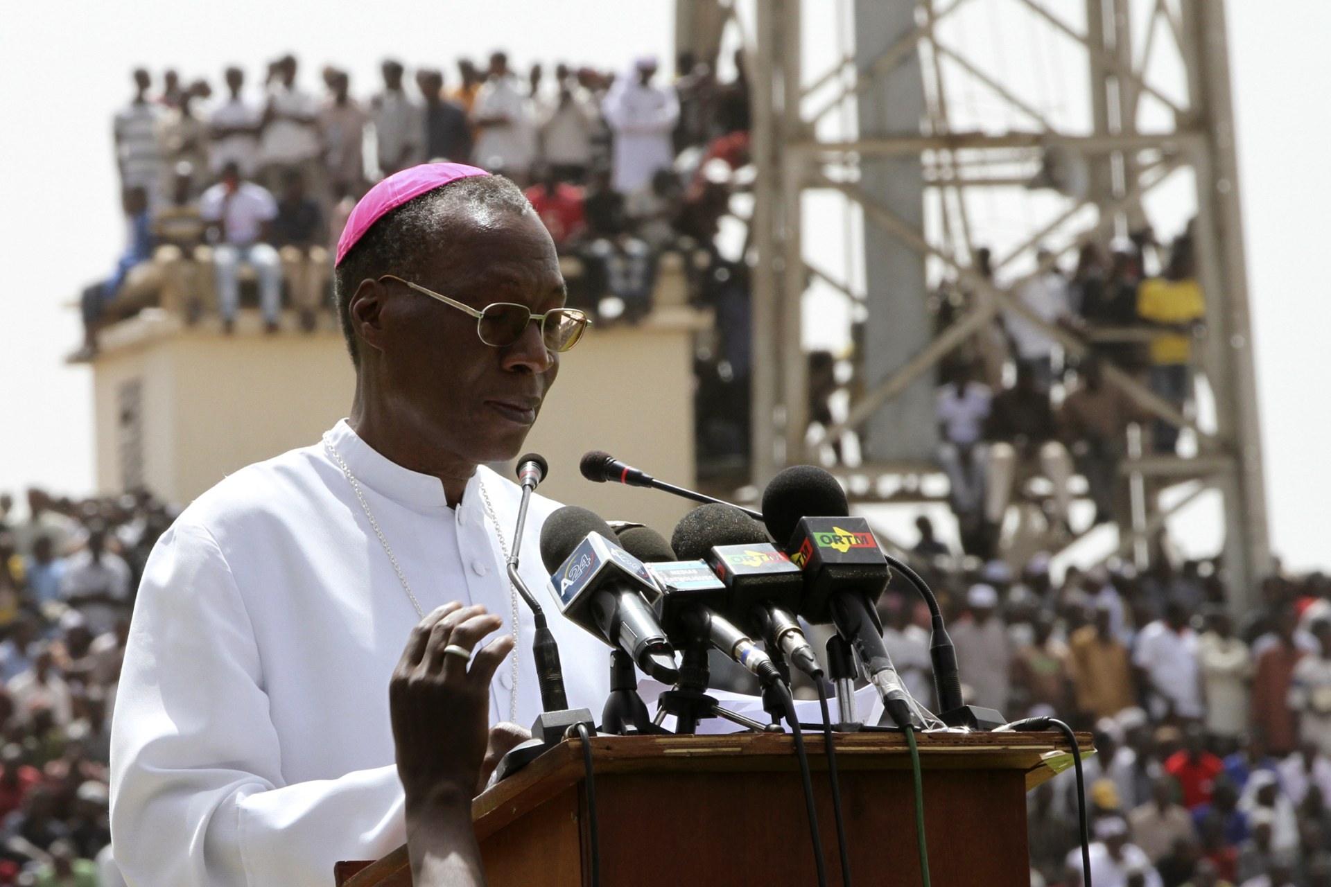 <p>Archbishop Jean Zerbo speaks to Muslims and members of other religions during a rally to help calm the political situation in Mali, in Bamako March 31, 2012. He was one of five new cardinals elevated by the Pope on June 27.</p>