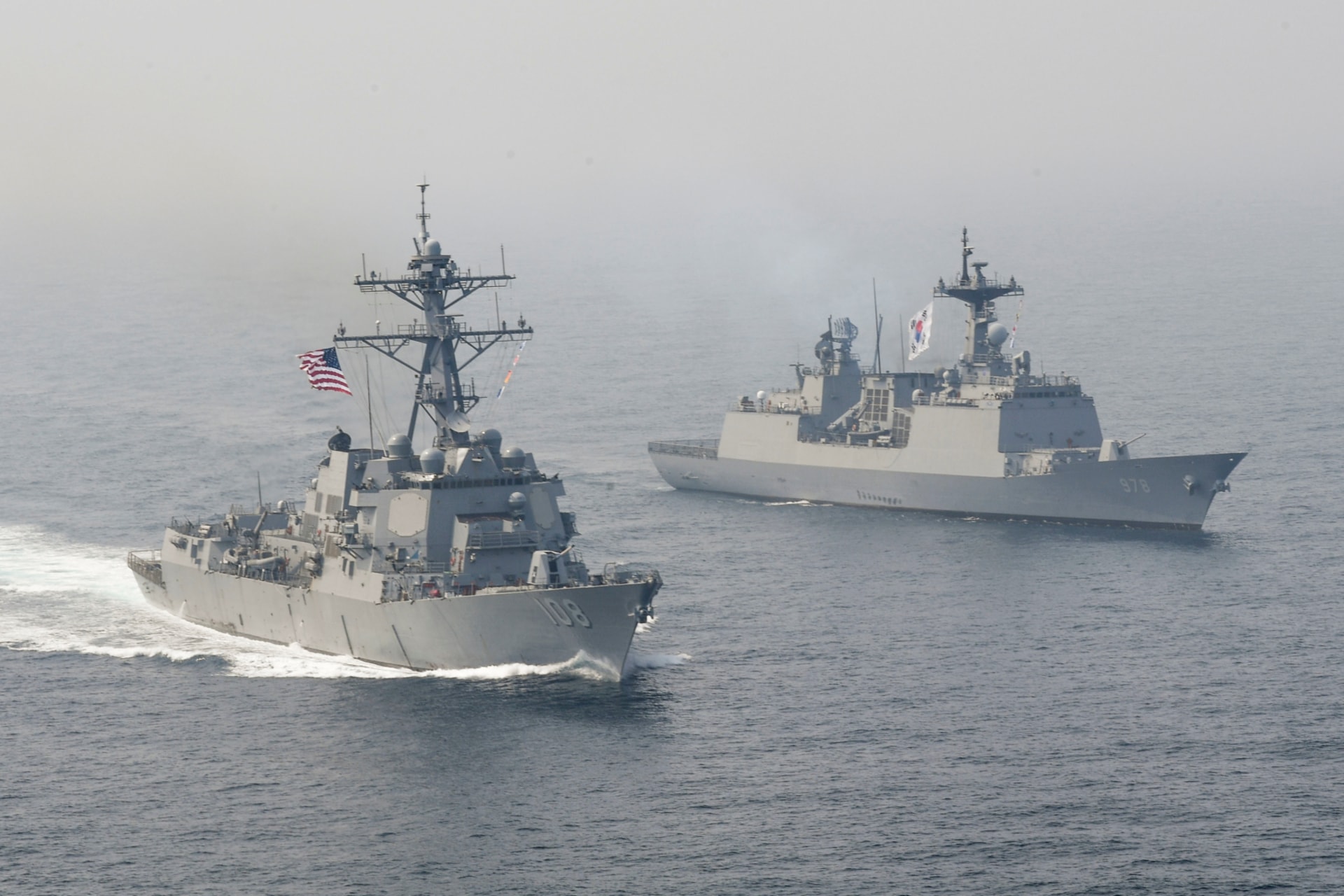 <p>The U.S. Navy Arleigh Burke-class guided-missile destroyer USS Wayne E. Meyer sails alongside South Korean multirole guided-missile destroyer Wang Geon during a bilateral exercise in the western Pacific Ocean. April 25, 2017.</p>
